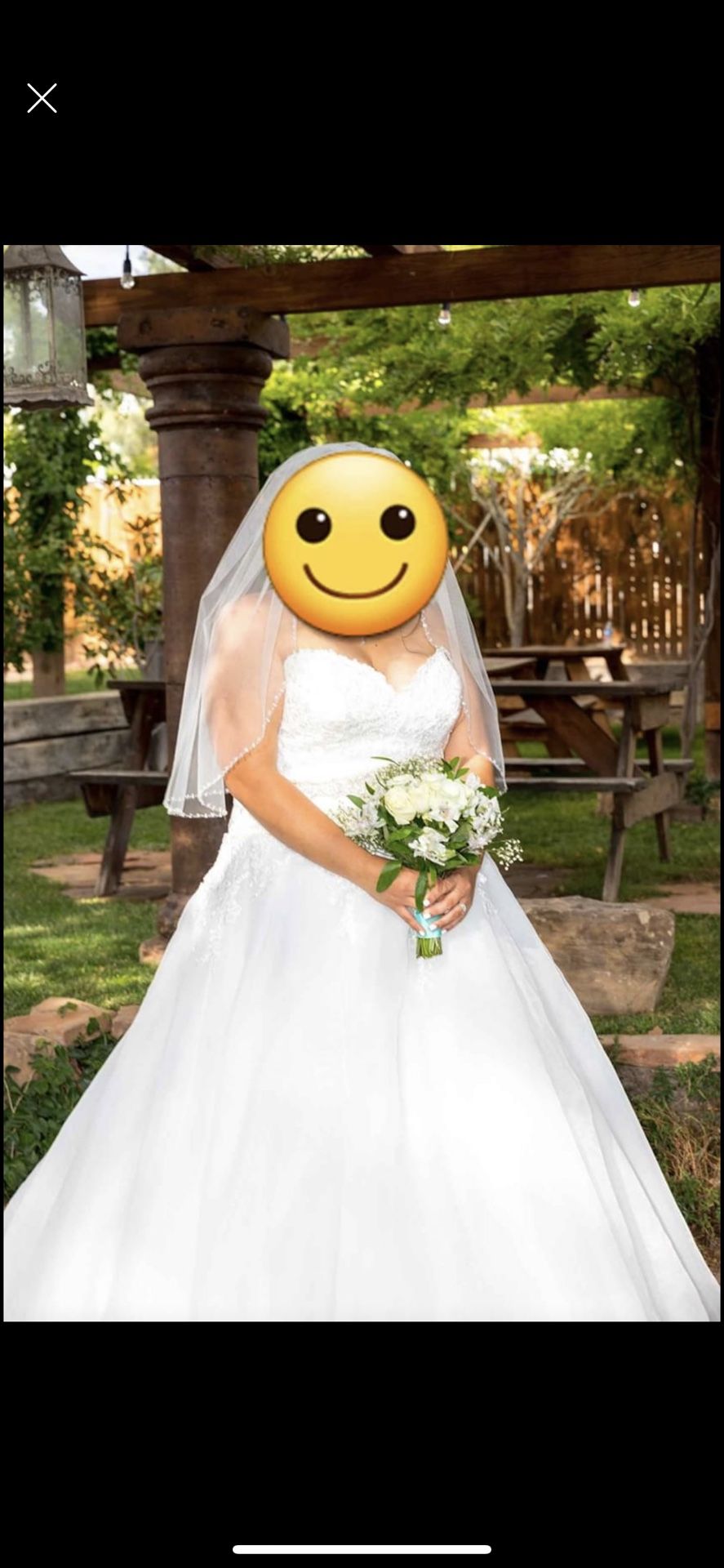 Used Rebecca Ingram corset back wedding dress size 20.
