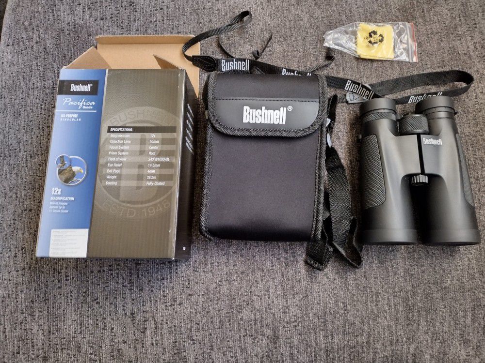 Binoculars Bushell  brand new in box