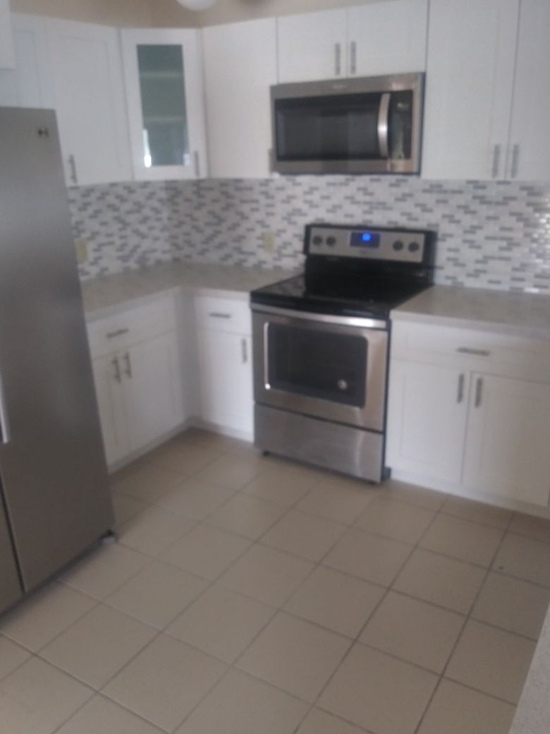 Solid wood kitchen complete with quartz