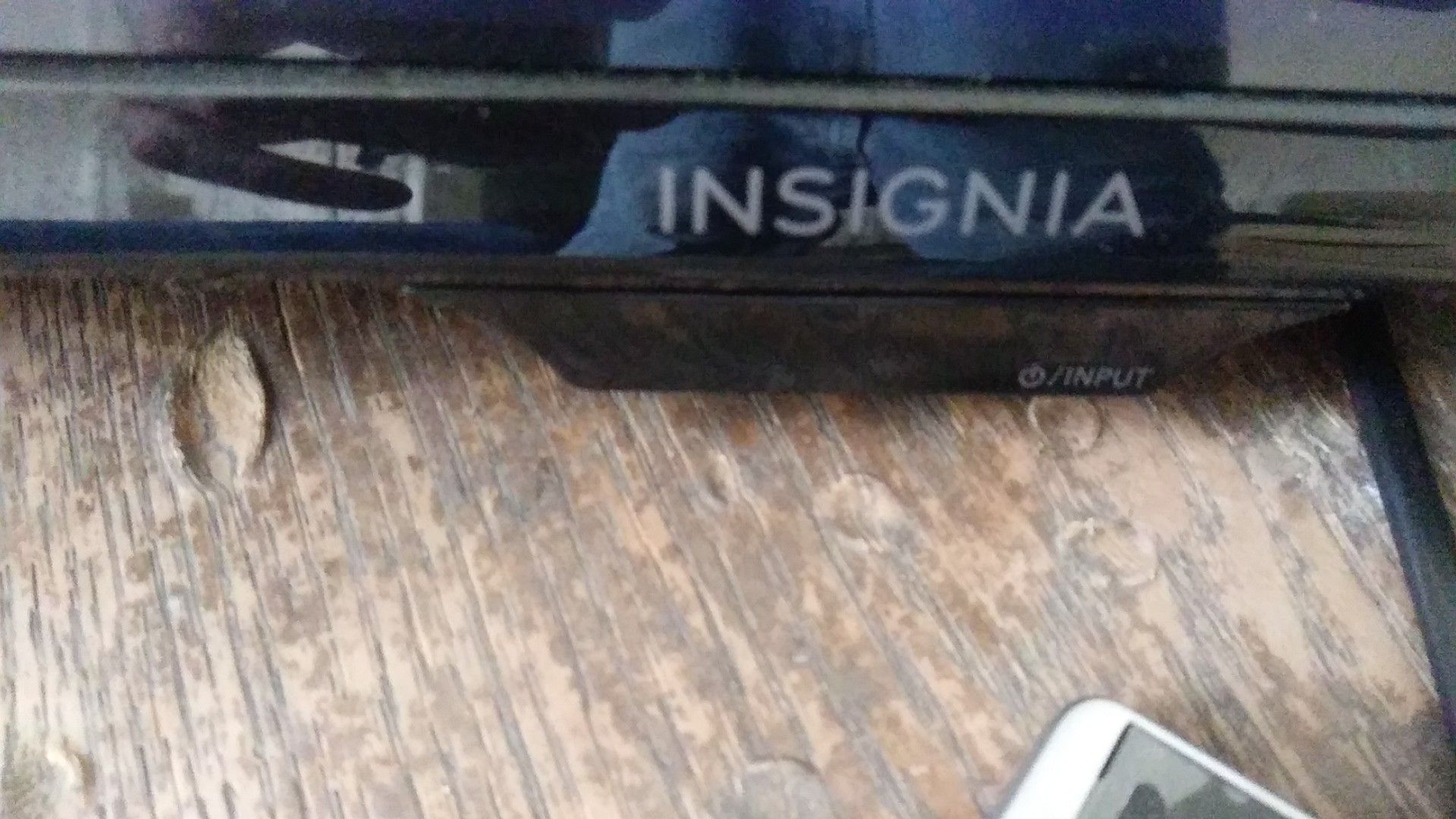 Insignia TV with Table Pad