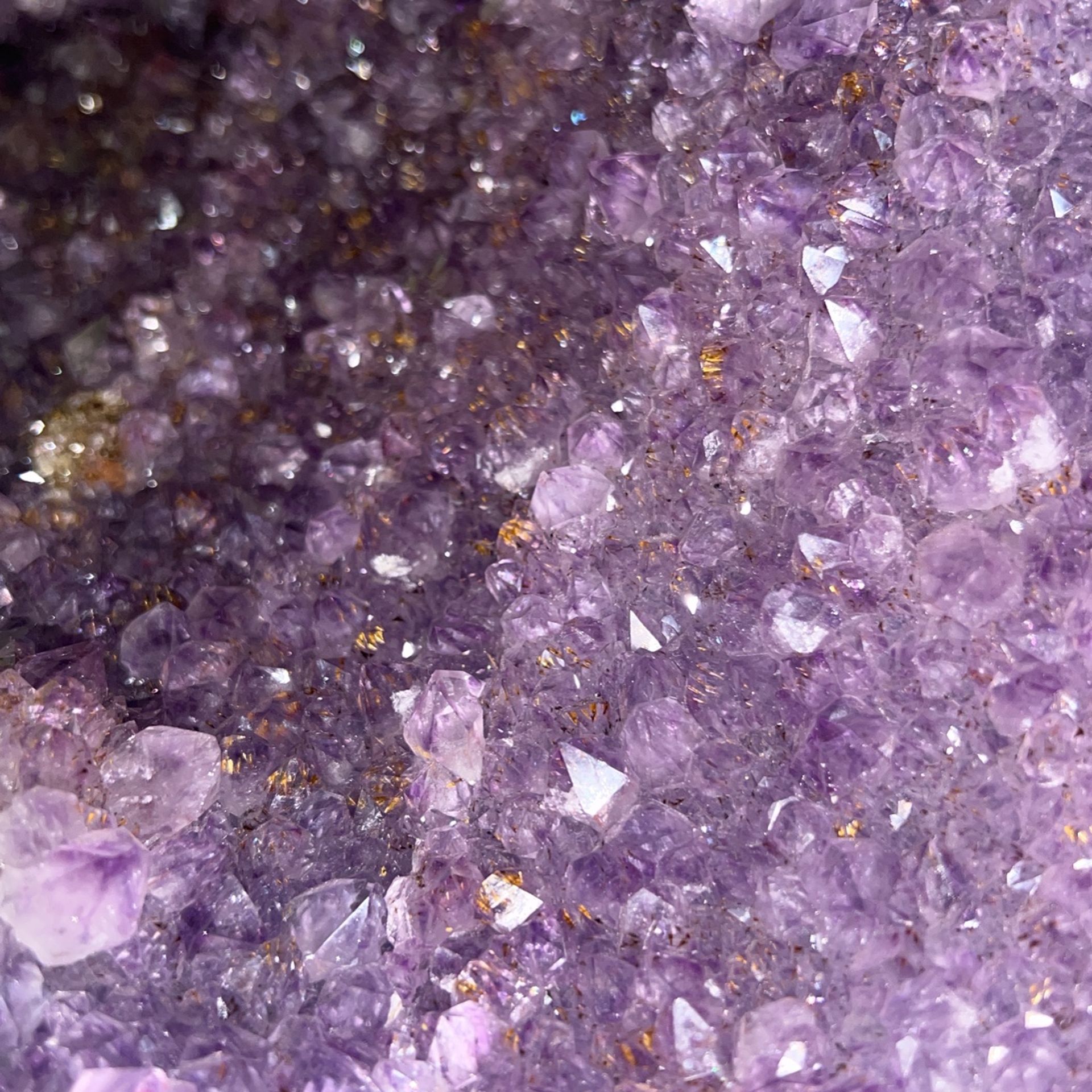 Set of two purple amethyst crystal geodes