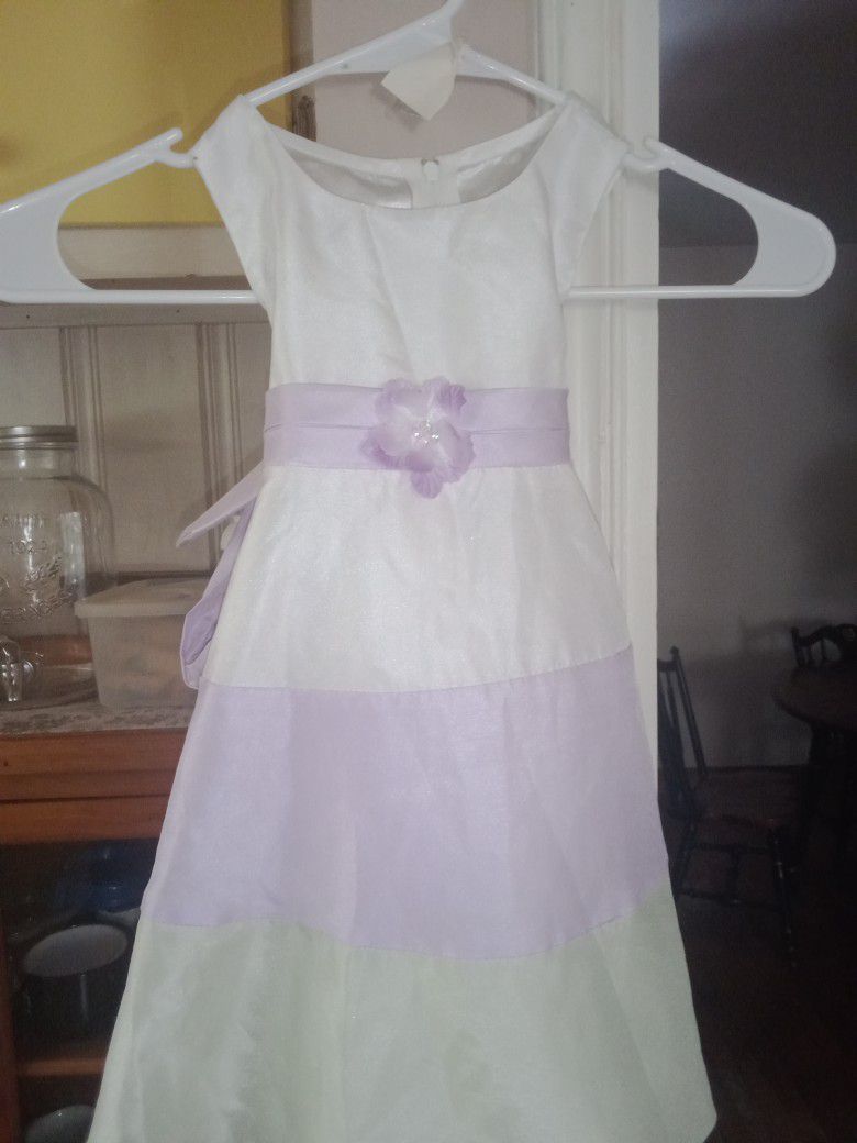 4 Toddler Dresses.  All Size 2T.  Price Is For All