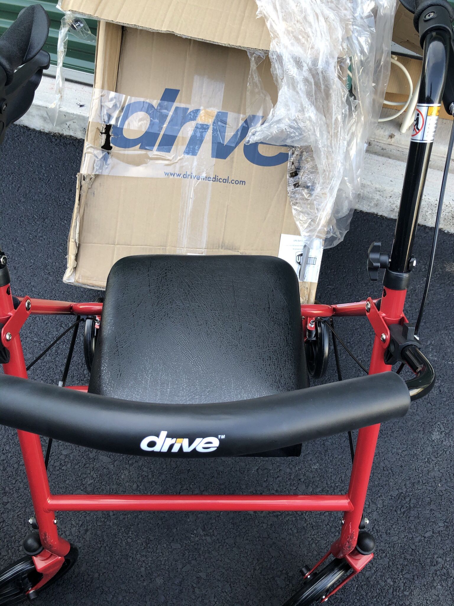 Brand New 4wheel Walker with small dent