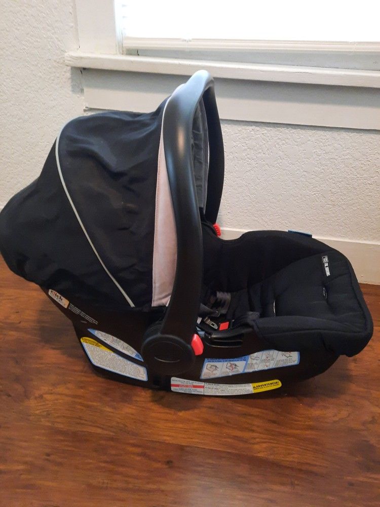 Graco FastAction Fold SE Travel System With SnugRide Infant Car Seat And Stroller