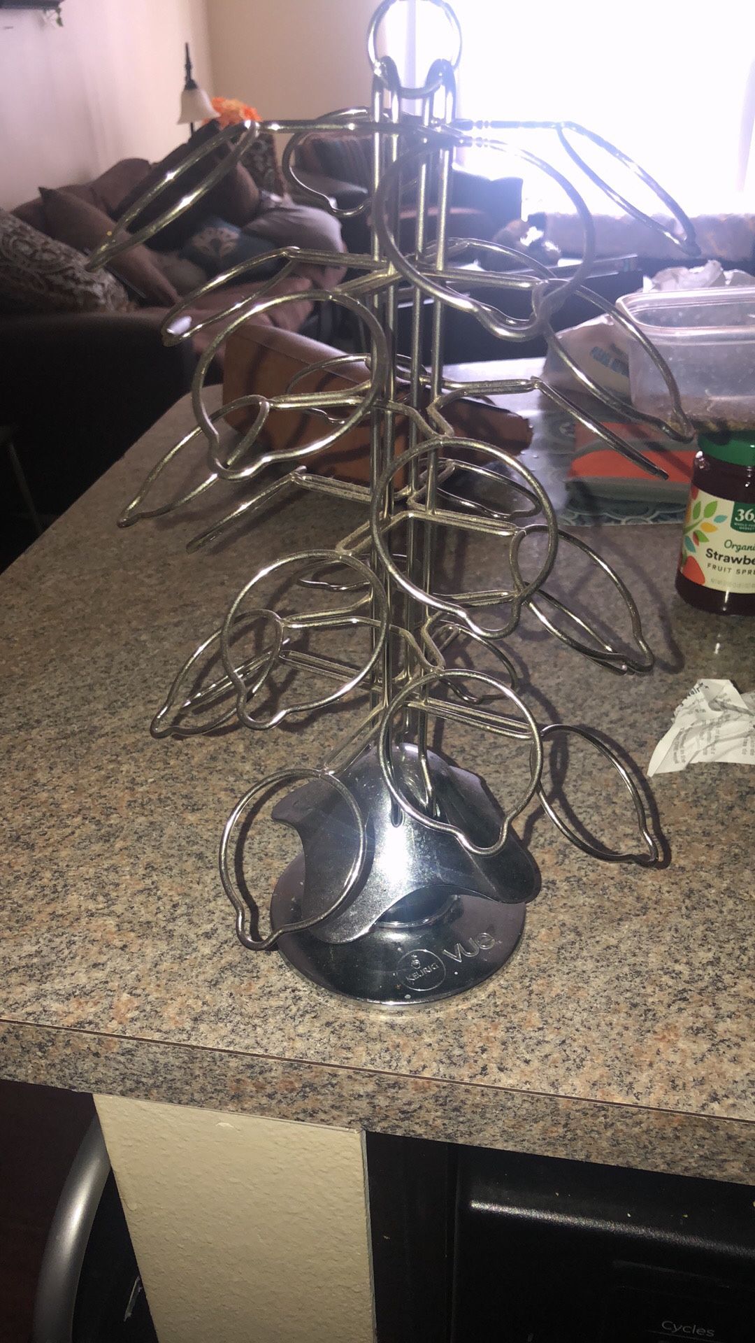 Kurieg and coffee cup holder