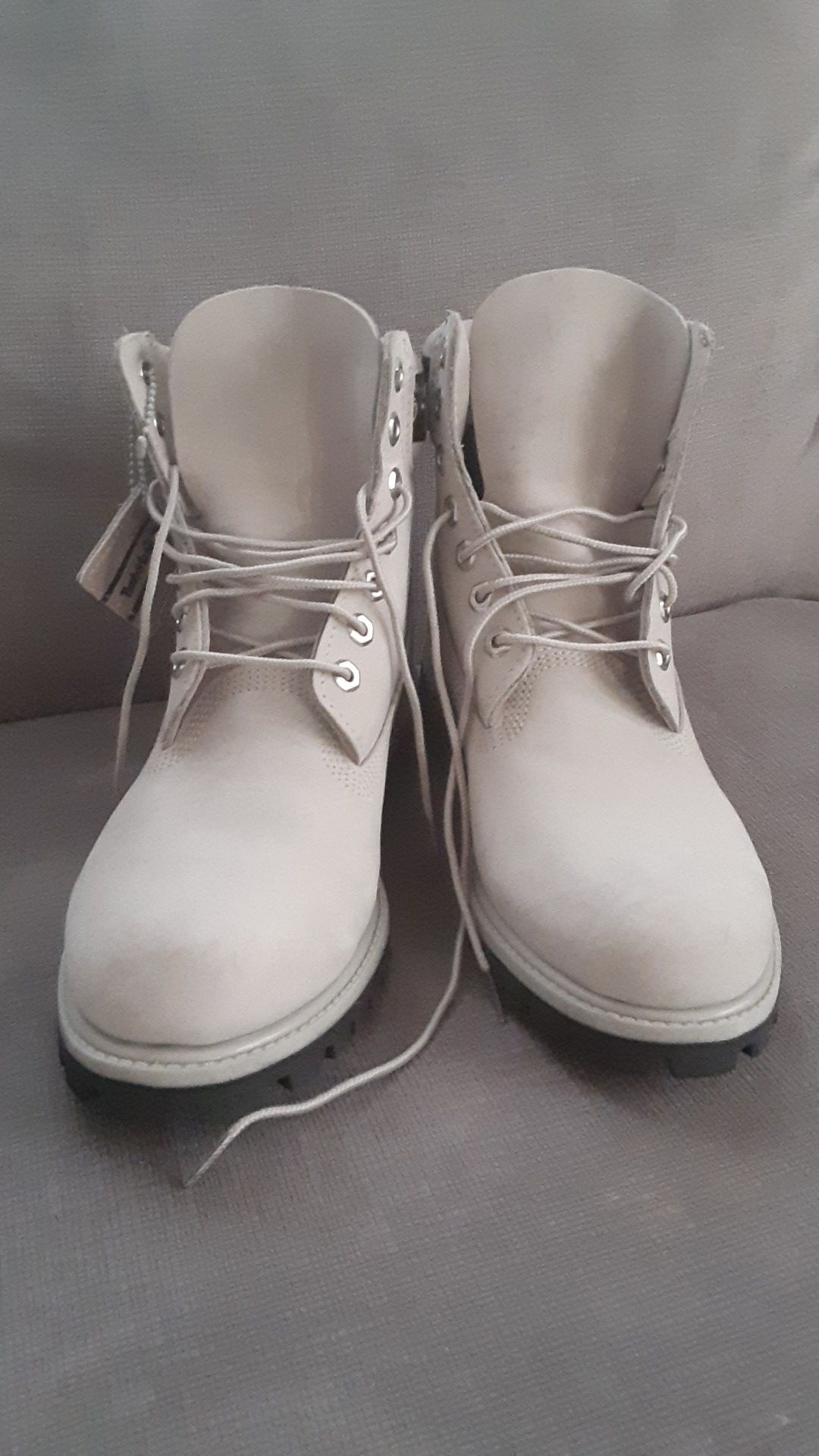Size 9. Gray Timberland Boots Waterproof worn only 4 times. Need $100