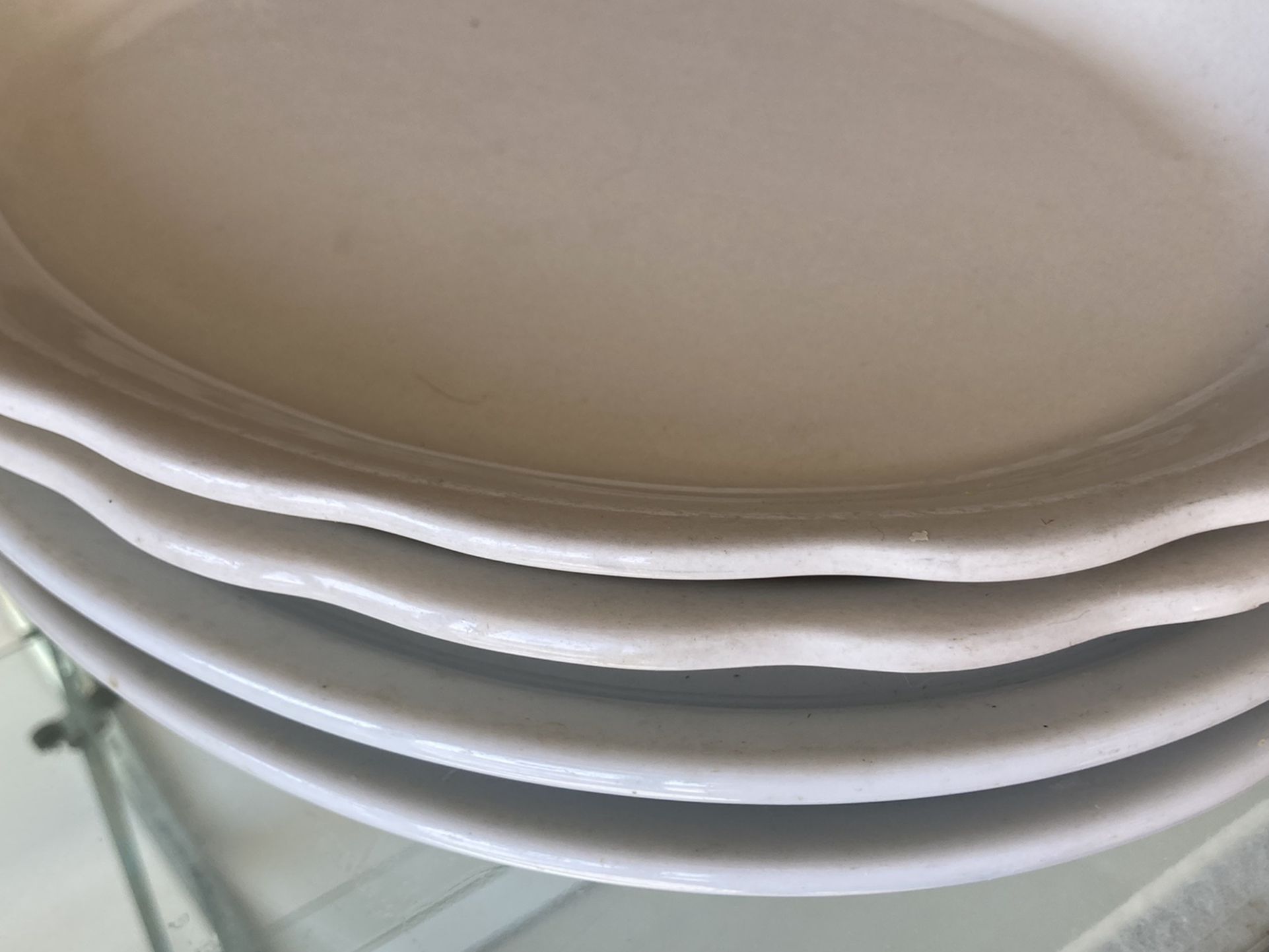 Four commercial quality heavy serving plates 