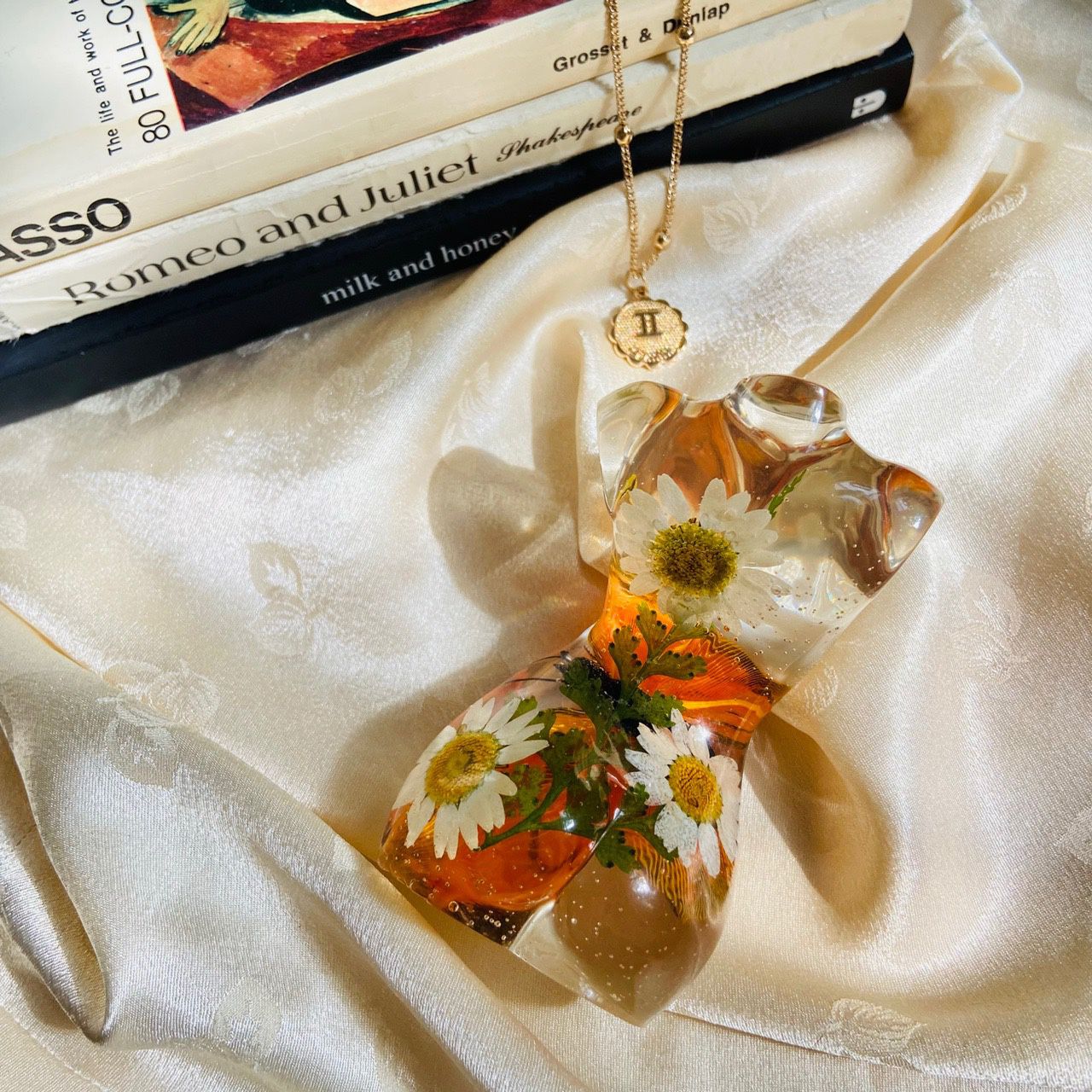 Handmade clear epoxy resin goddess figurine made with real dried pressed flowers & faux butterfly