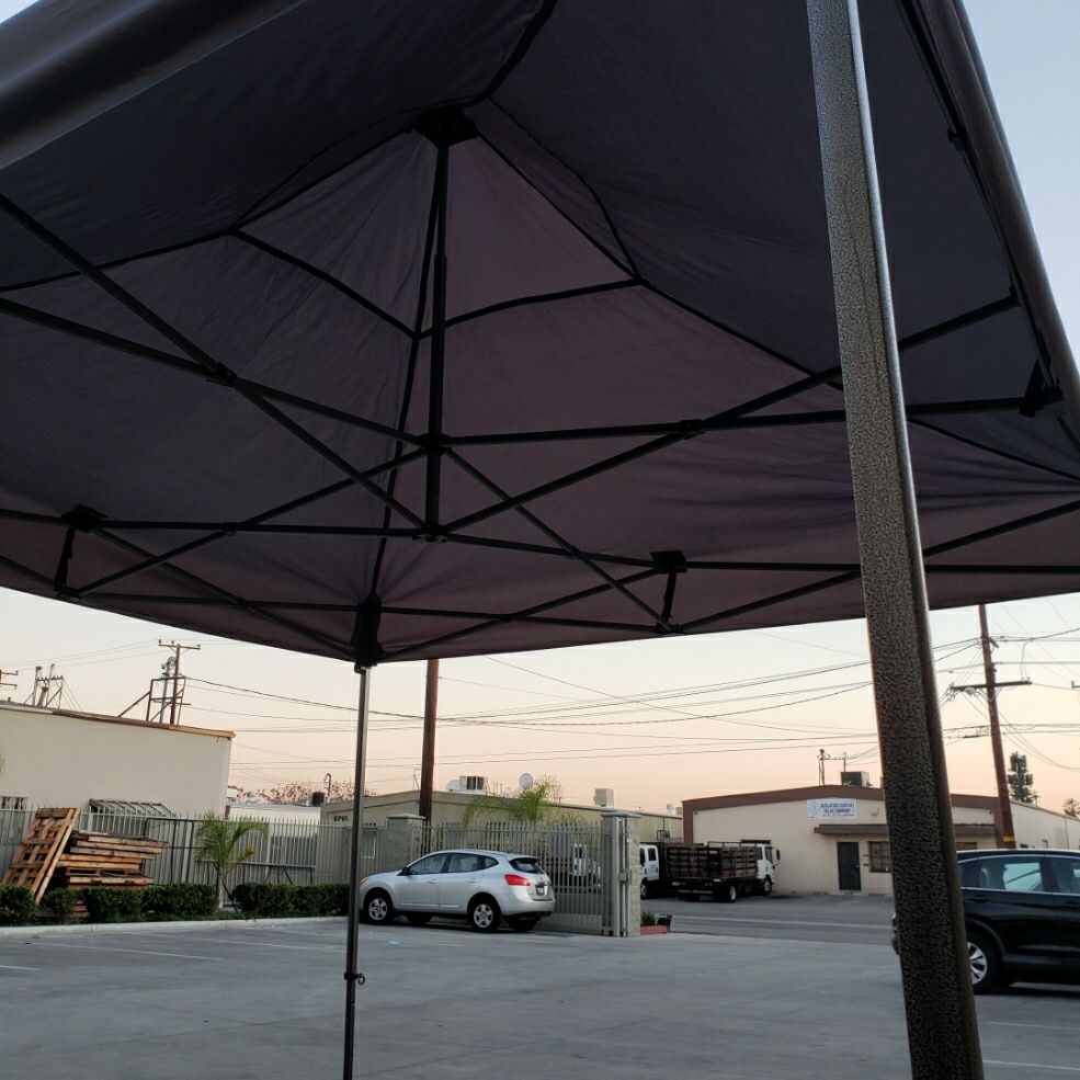 New in box EZ pop up canopy tent 10x10 feet waterproof sunshade party tent height adjustable with wheeled carrying bag