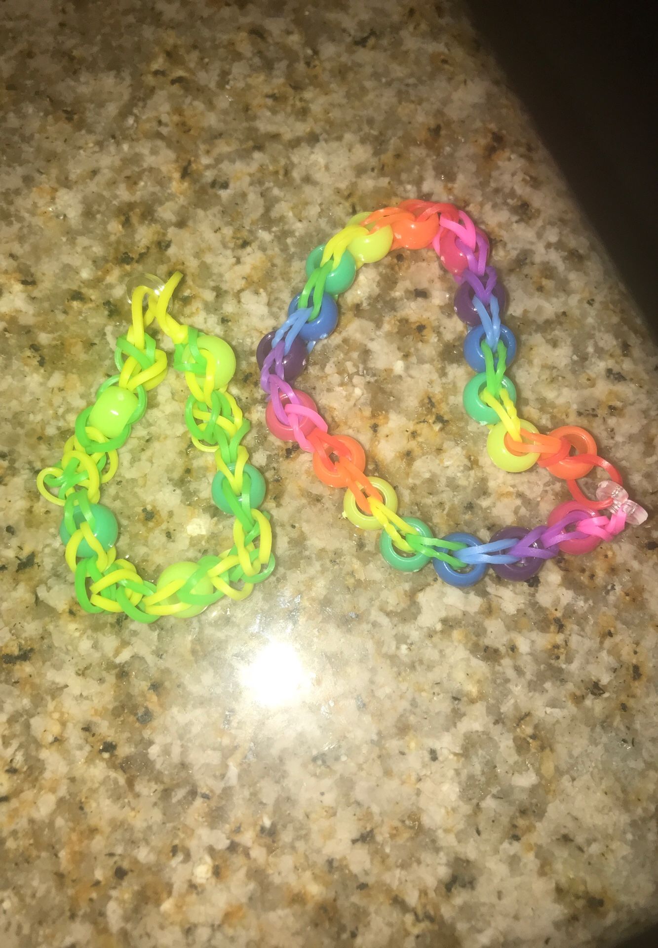 Rainbow loom bracelet.green and yellow with beads, rainbow with beads
