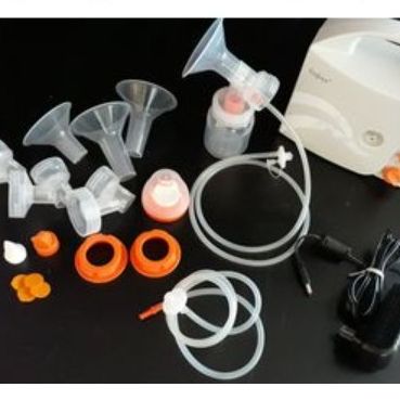 Hygiene Enjoy Breast Pump.Hospital GRADE .Has Extra Pieces And Comes With A Wide Rim Bottle . Adapter To Fit A Standard Size Bottle