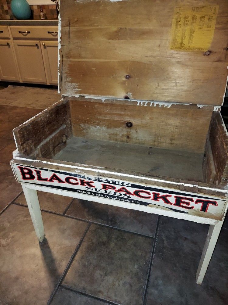 Vintage antique black packet seeds predona seed company display case