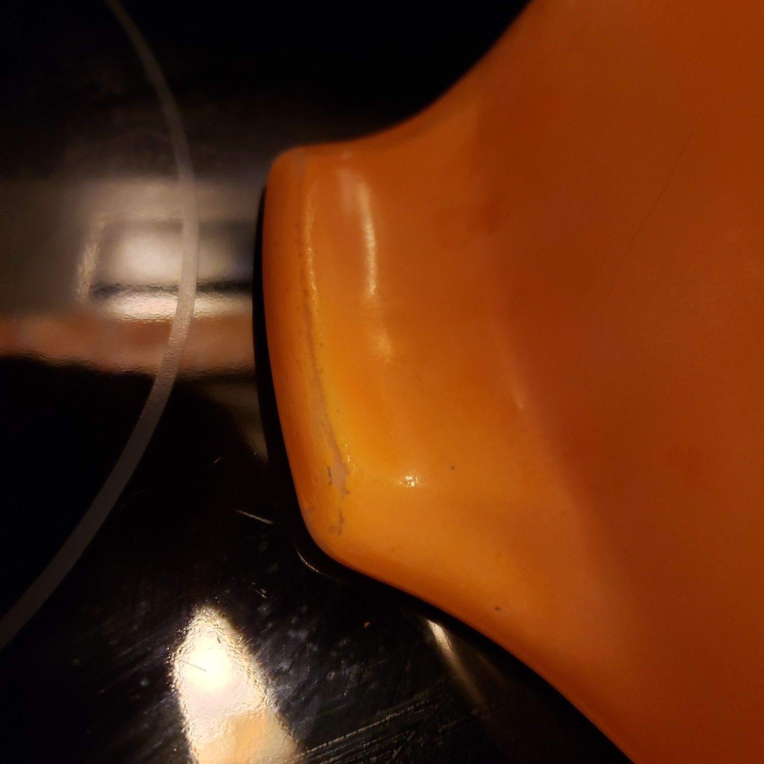 Pyrex small orange bowl..