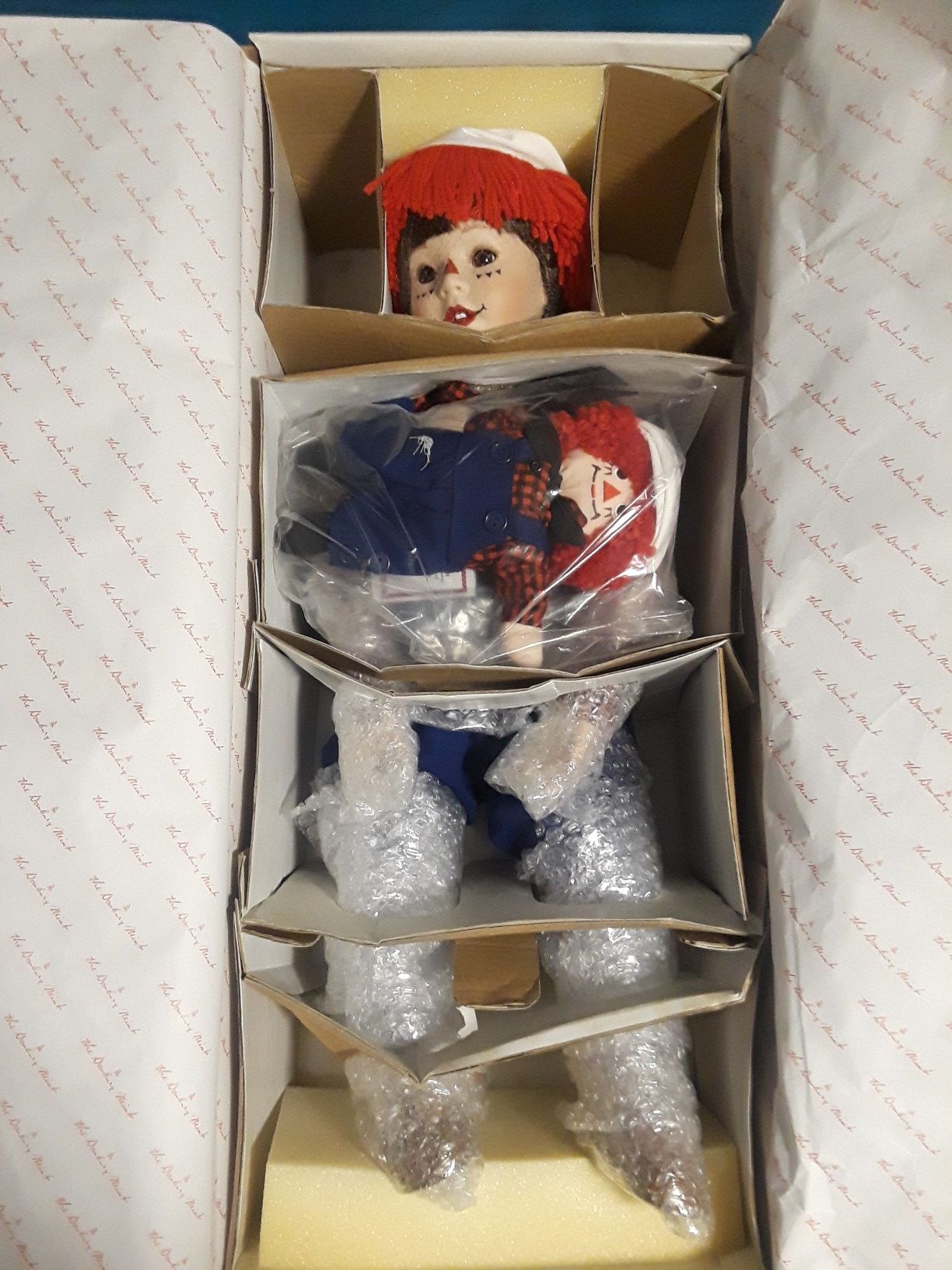 Raggedy ann & andy porcelain dolls