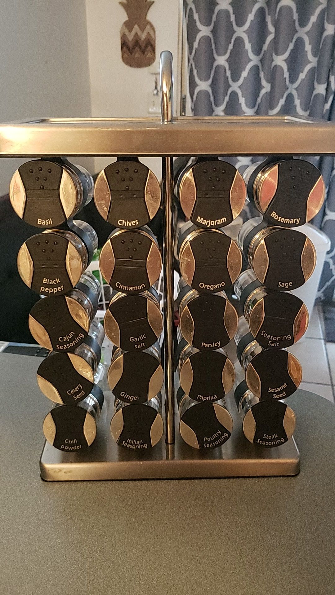 Spice rack with labeled glass jars