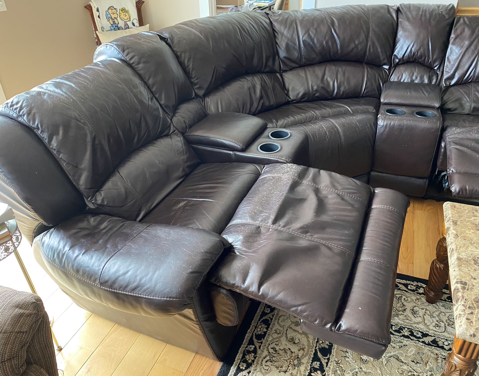 Leather Couch with 3 Built In Manual Recliners, 4 Drink Holders And 2 Storage Areas