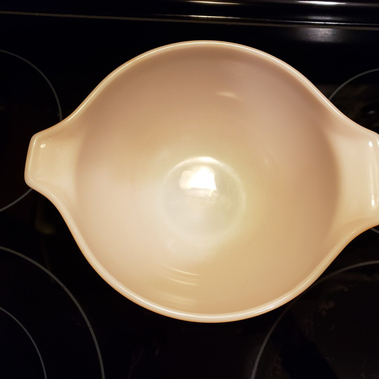 Pyrex small orange bowl..