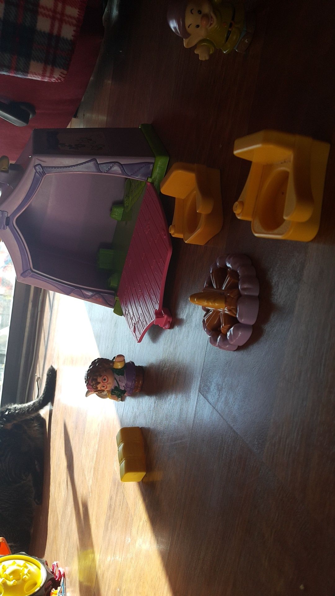 Fisher Price Little People Camping set. The door of the tent closes and the items store inside. Has a carrying handle on top.