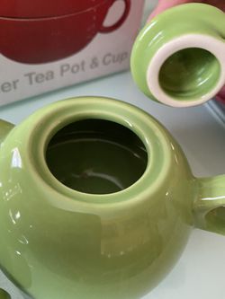 Tea pot and cup Thumbnail