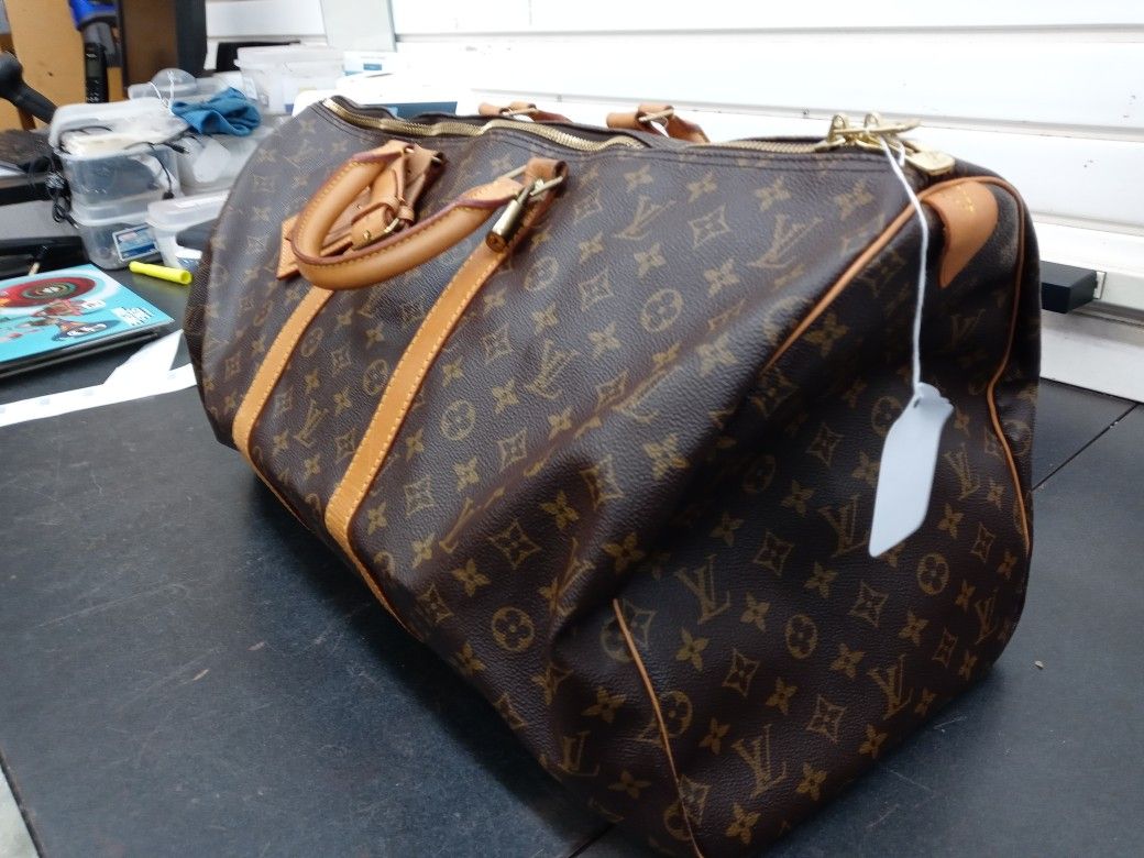 Louie Vuitton Duffle w/certificate