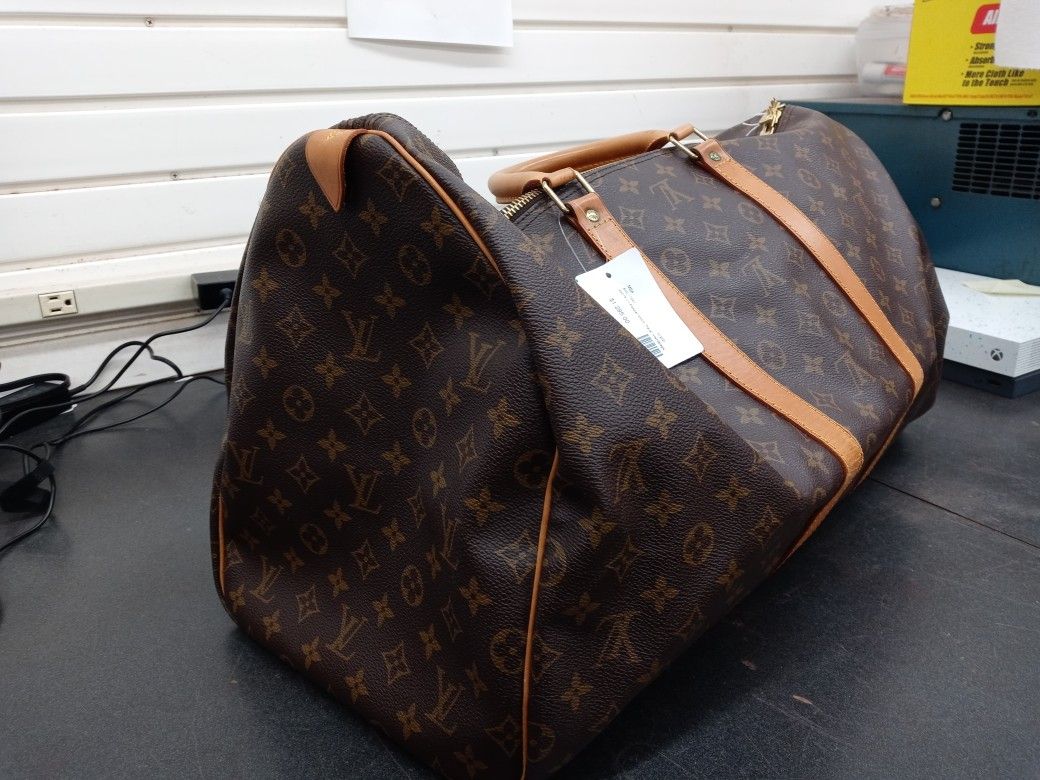 Louie Vuitton Duffle w/certificate
