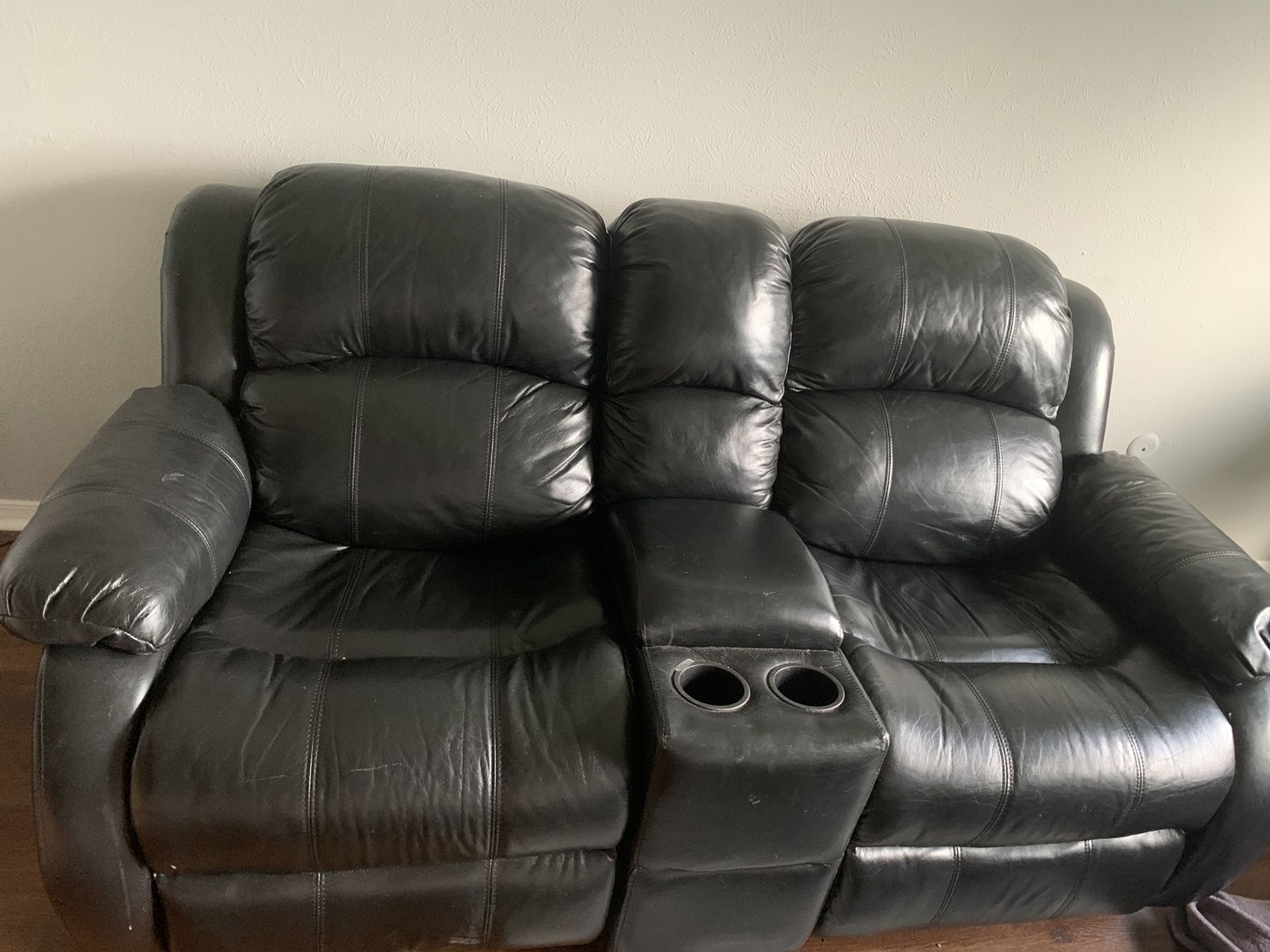 Black leather couch and loveseat