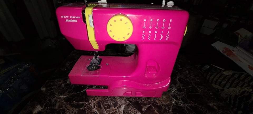 Janome Pink And Yellow Sewing Machine With Box