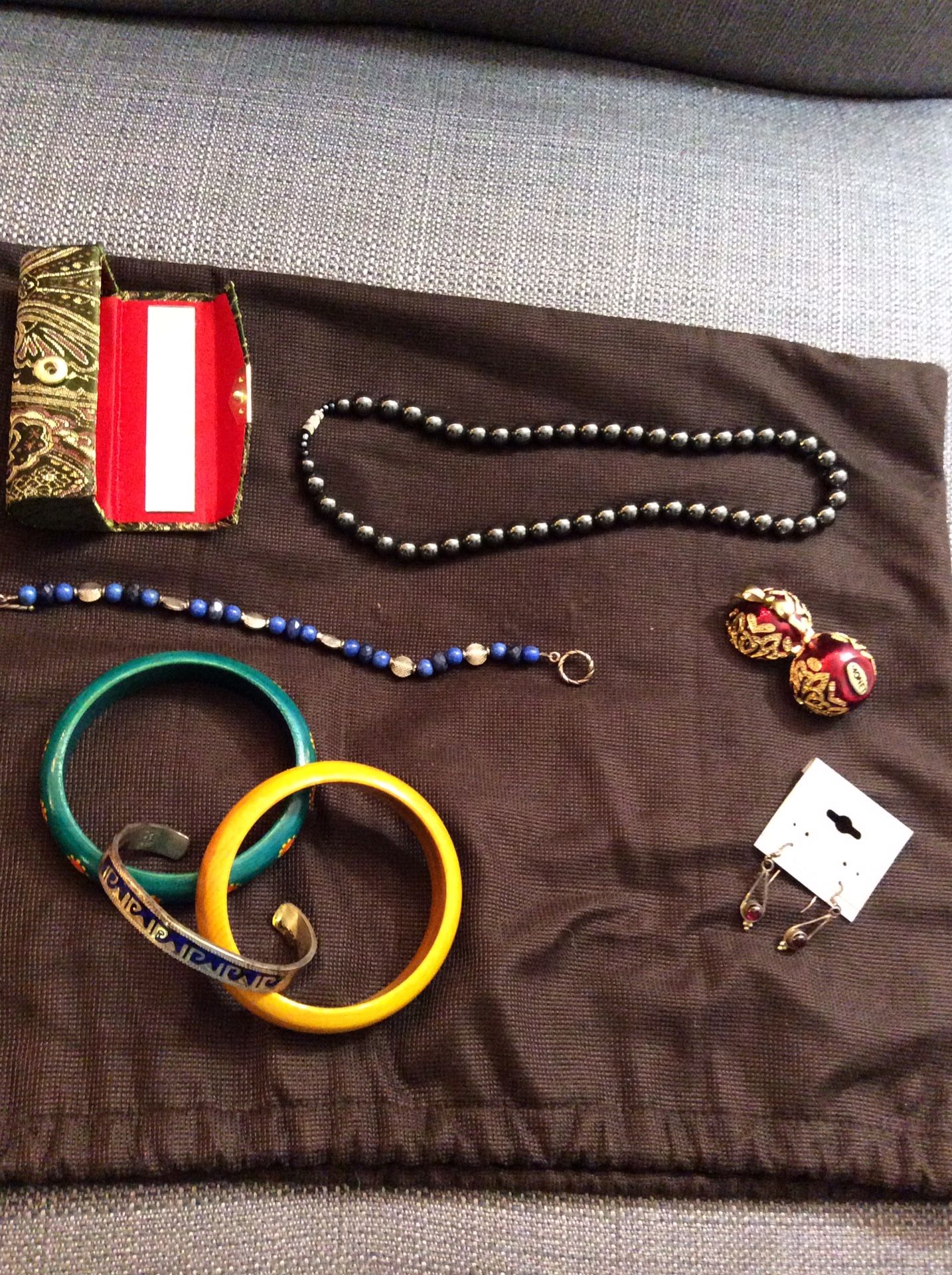 Lipstick holder, bracelets, earrings, necklace and pillbox