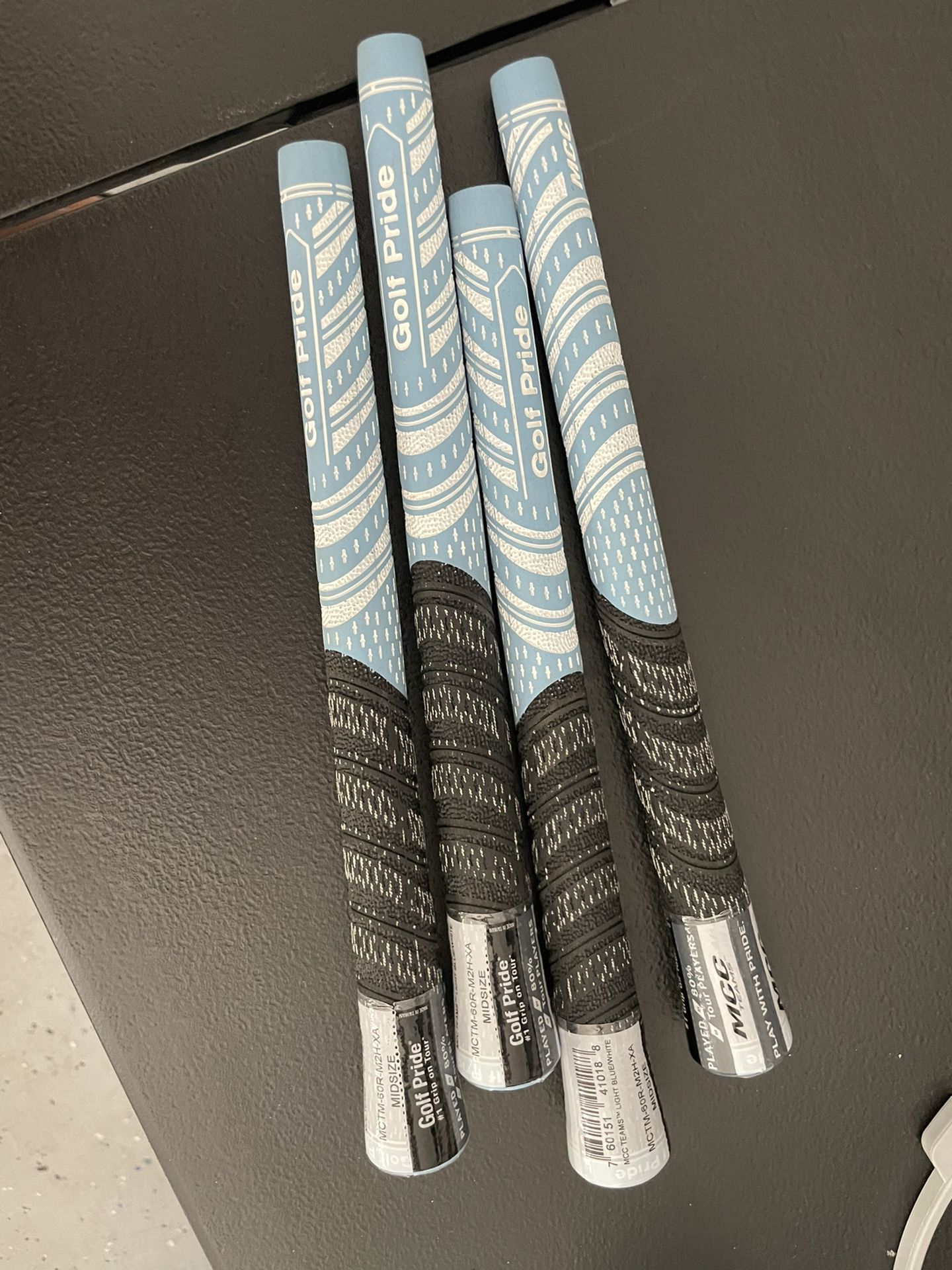 Golf pride mid size grips in light blue