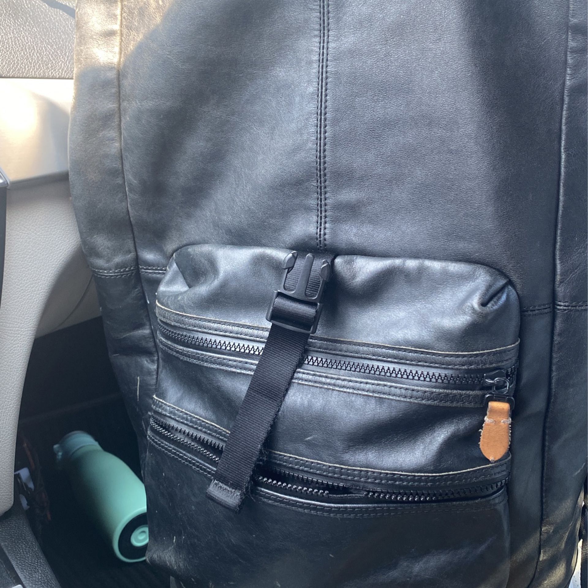Black Leather eastpak Roll Top Backpack  