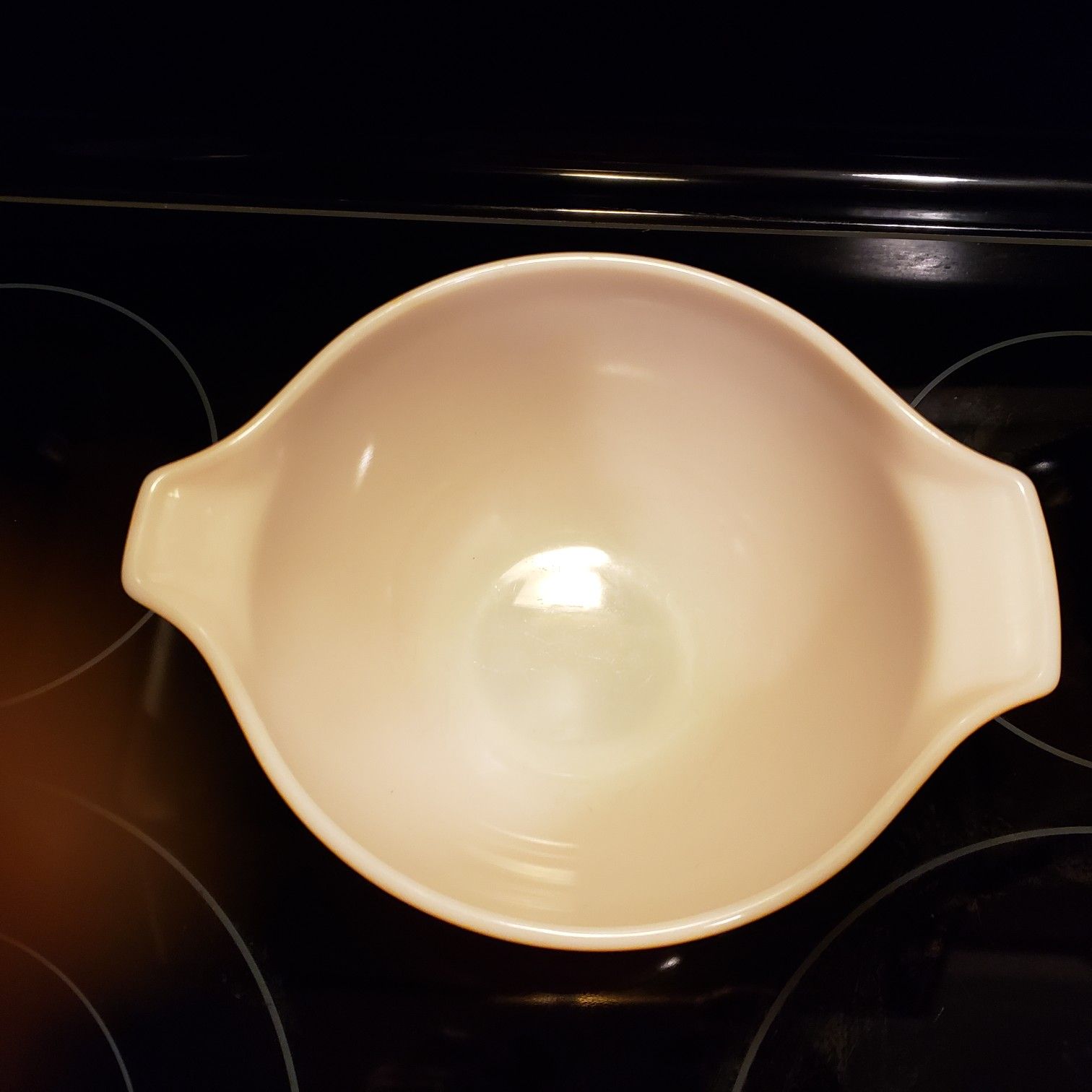 Pyrex small orange bowl..