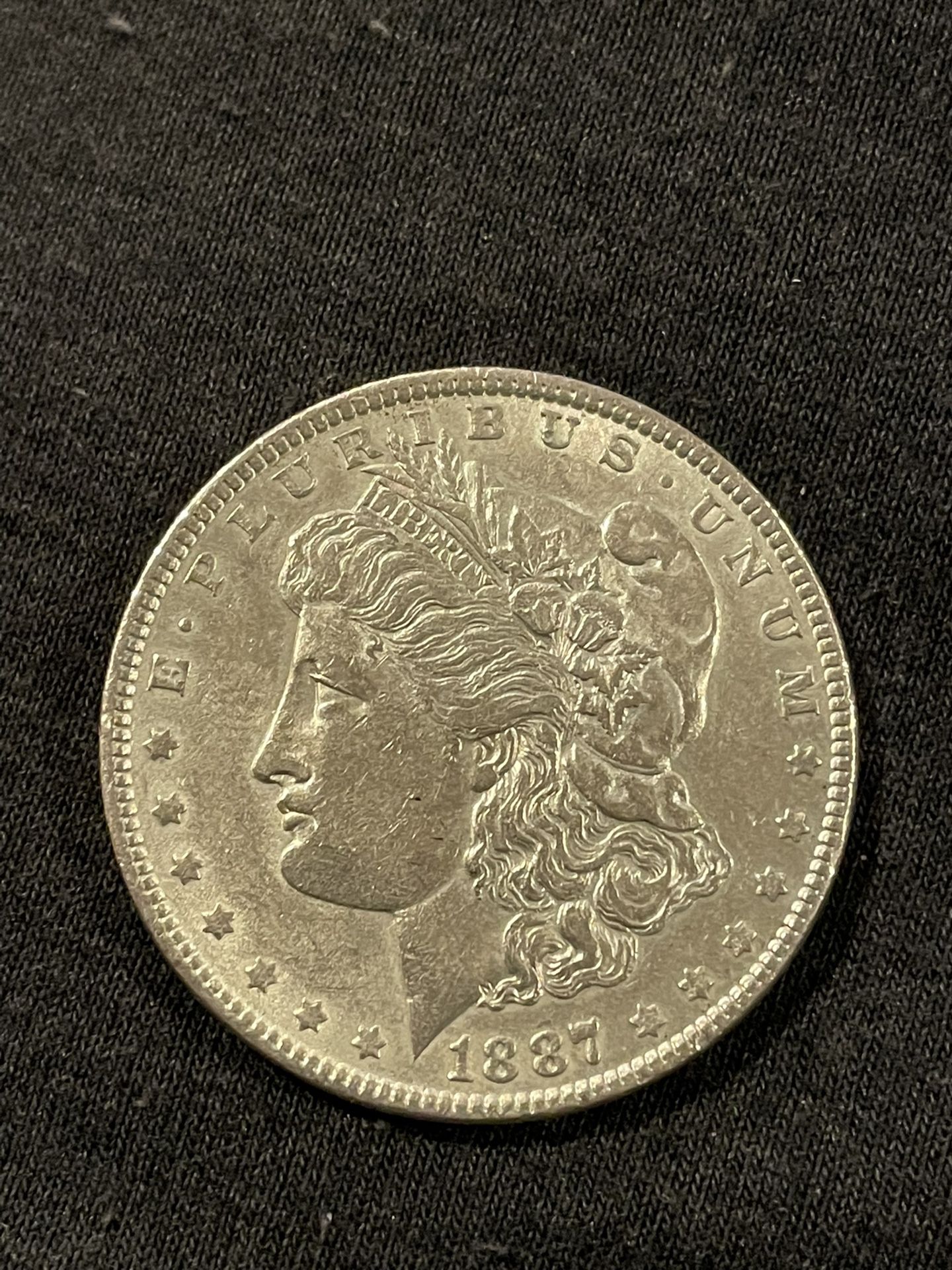 1887 🪙 Morgan Silver Dollar