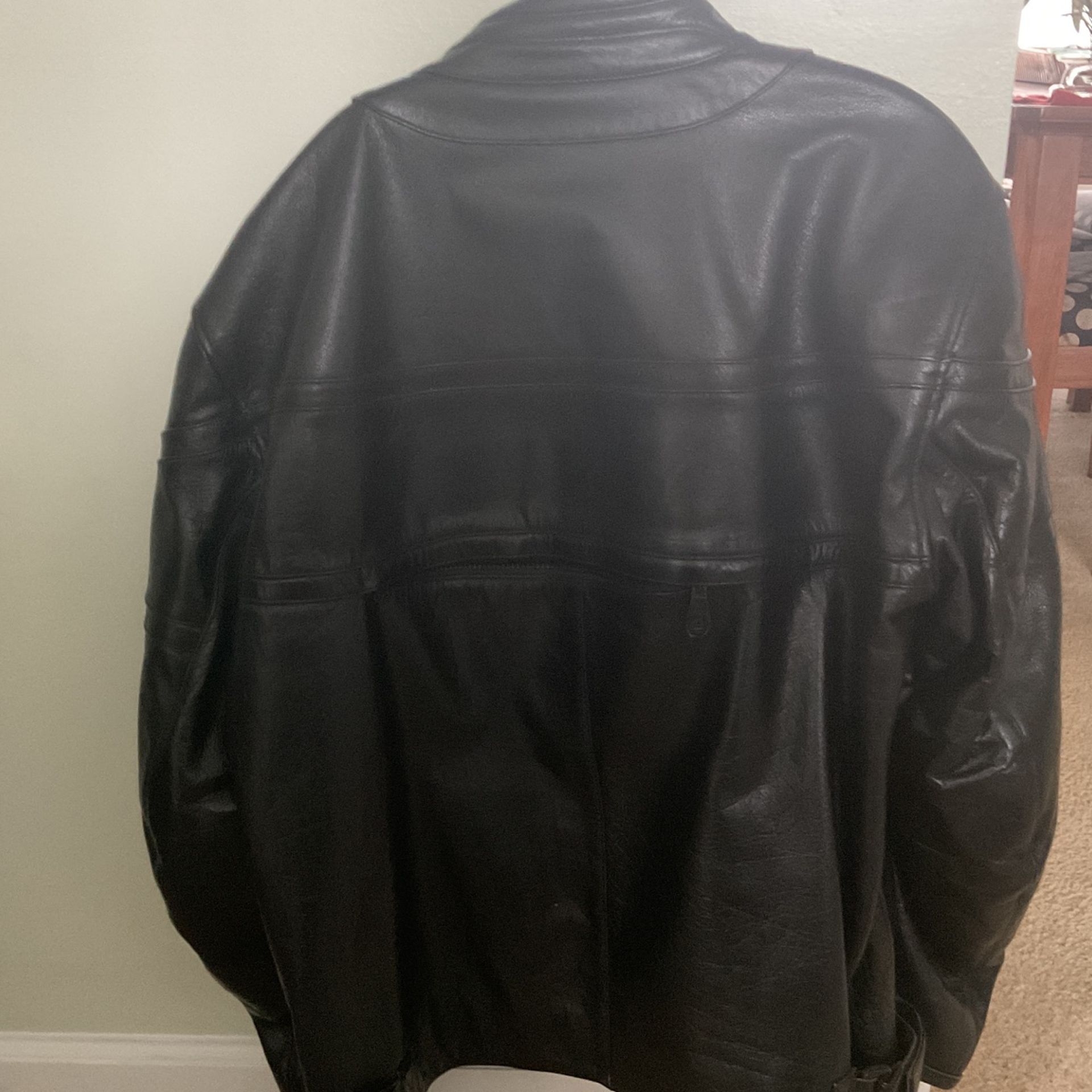 This is a motorcycle jacket larger with a padding at the elbows and back