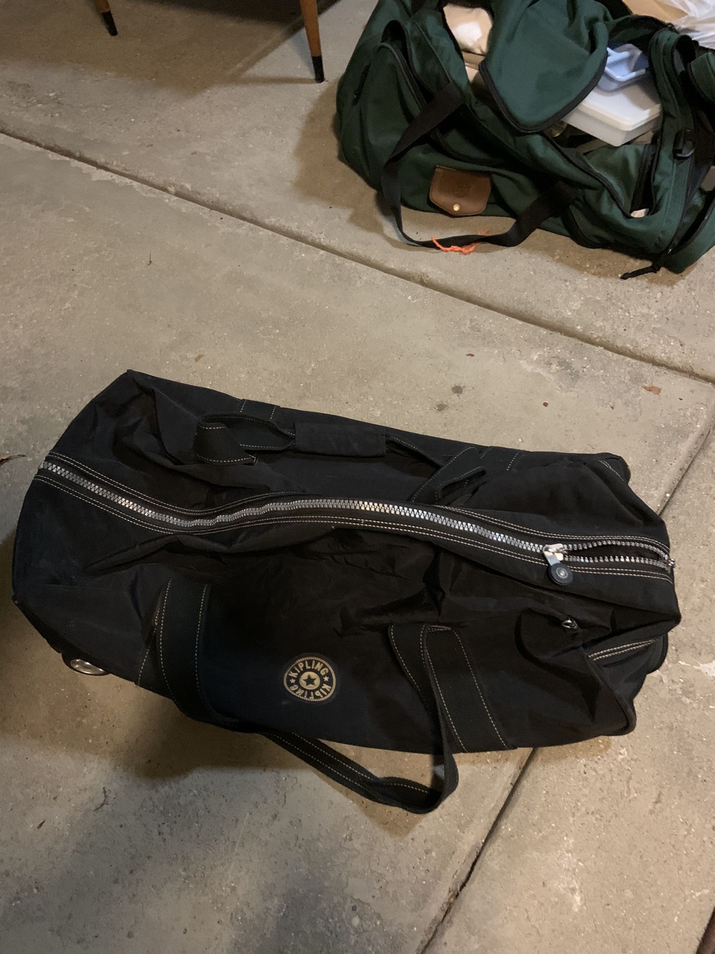 Kipling Rolling duffel bag