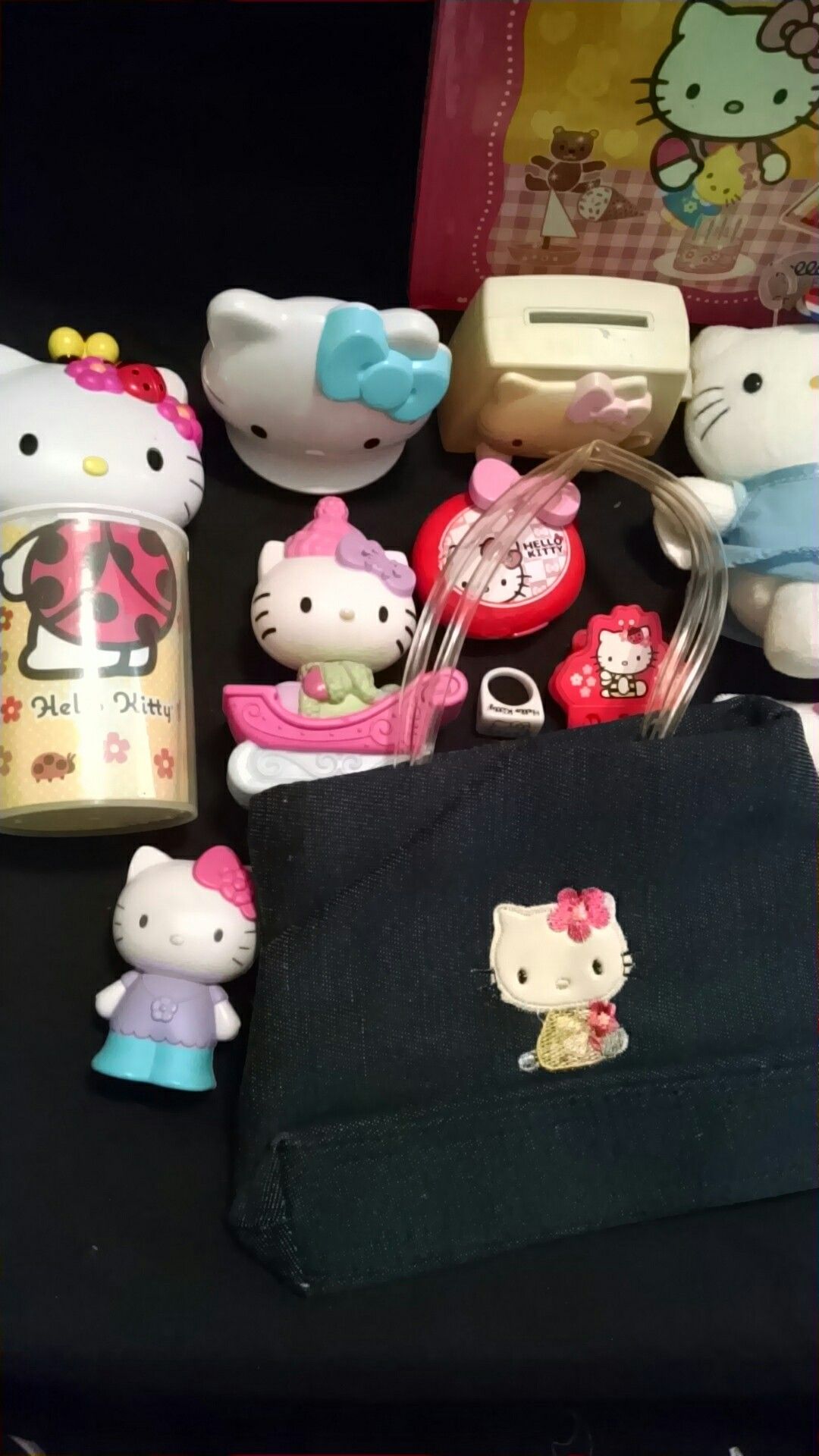 Hello Kitty purse, clock, lunch bag, CD, toys, books, ring & more