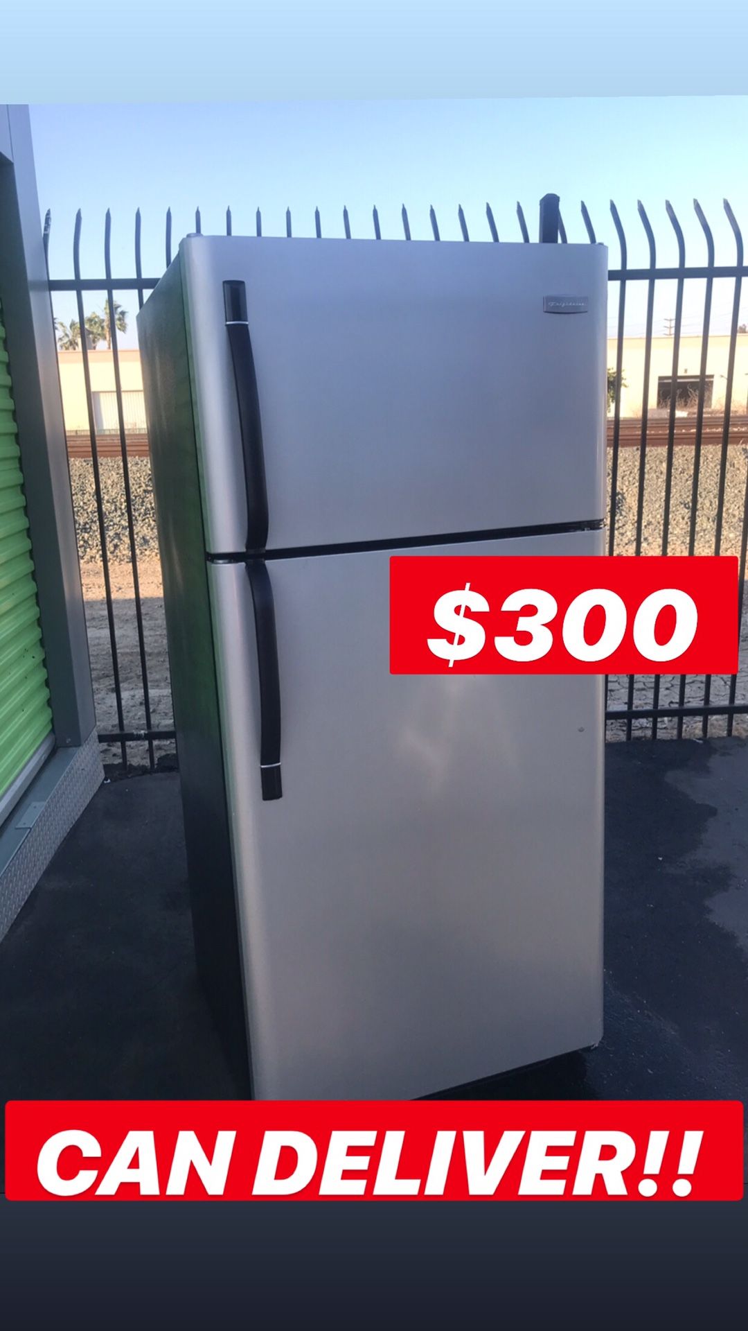 Stainless steel and black apartment full size Frigidaire refrigerator