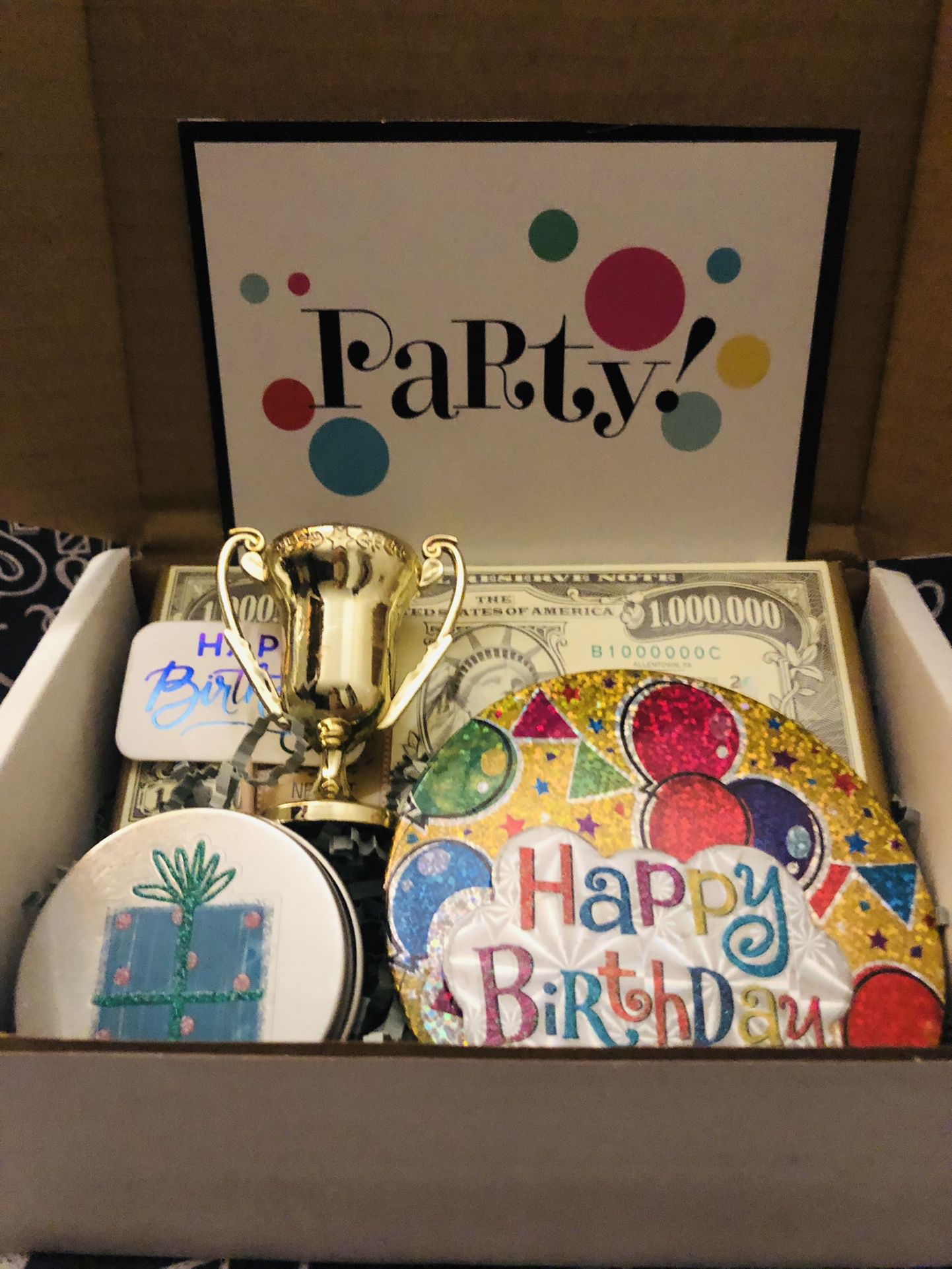 Happy Birthday Party Chocolate And Celebratory Trophy Along With Other Birthday Gifts 