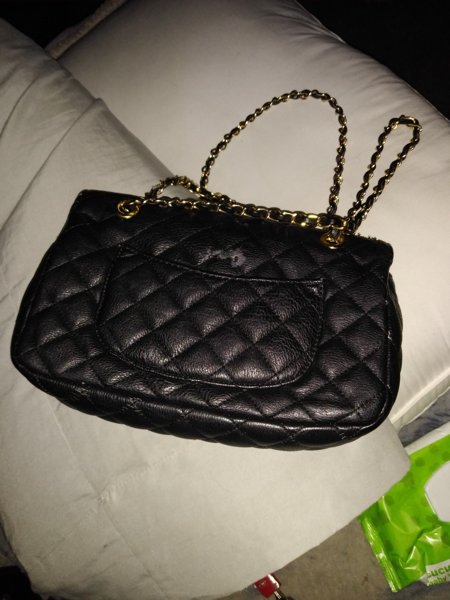 Black quilted bag.. price negotiable make offer