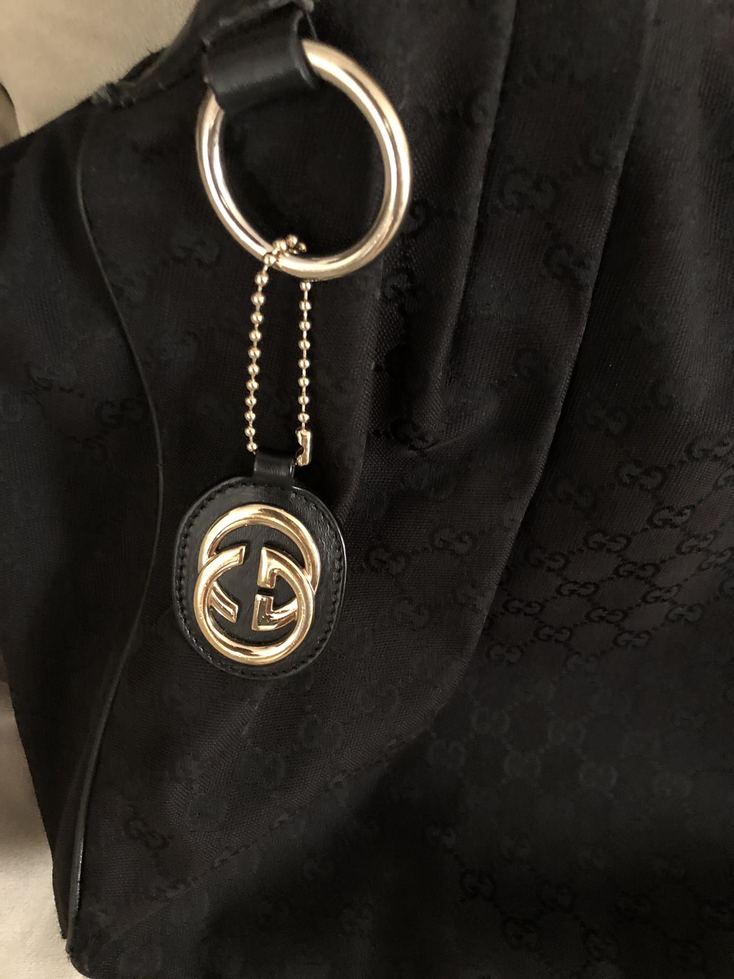 Large Authentic Gucci Sukey Handbag Tote canvas material with Gucci charm.