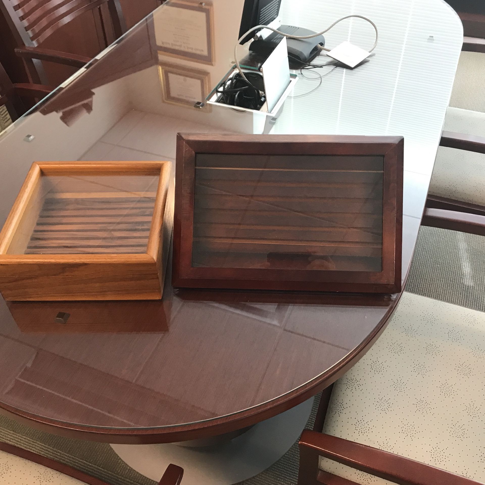Two wooden coin boxes with glass covers
