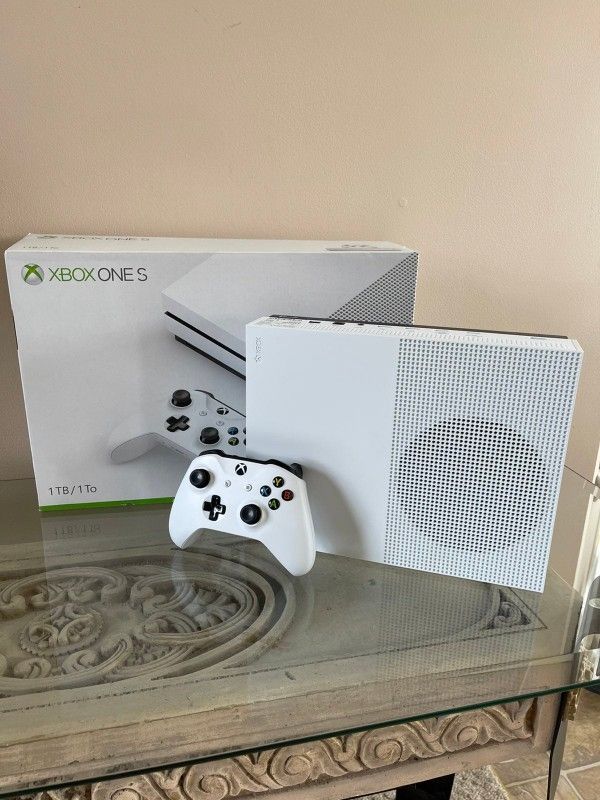 xbox one s am giving it out to bless someone who first wish me happy wedding anniversary on my cellphone number now 707^340^9916