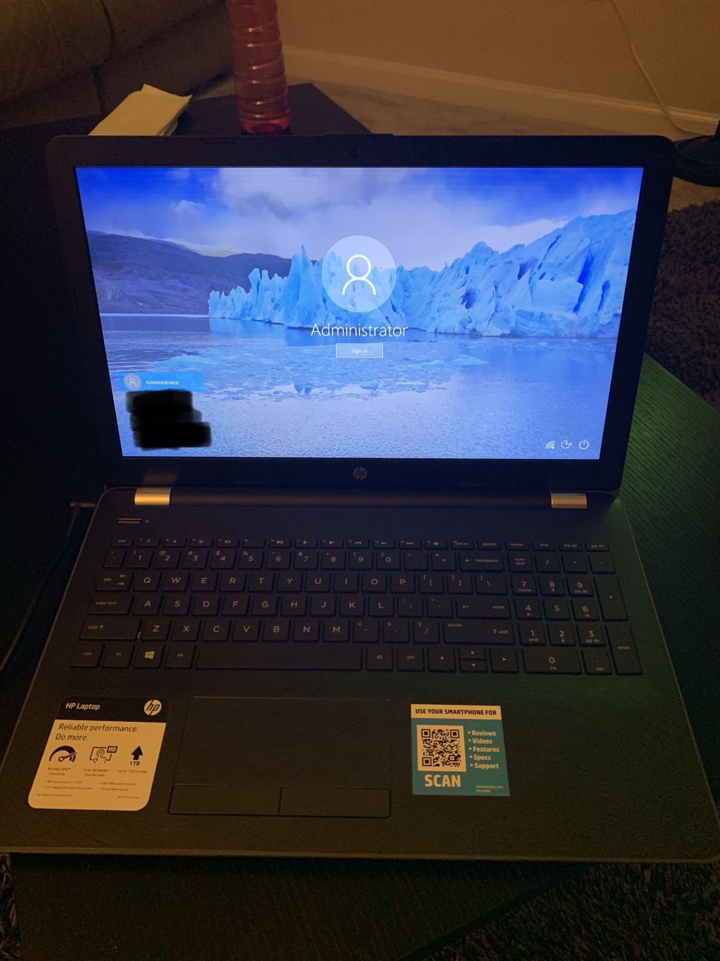 HP laptop with backpack and mice