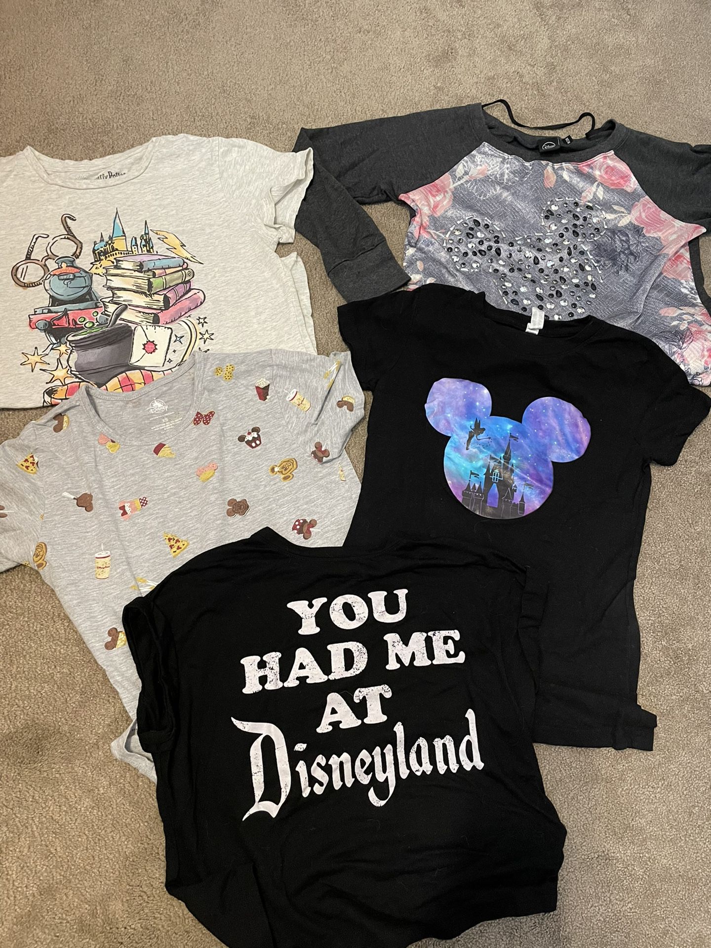 Five women’s Disney T-shirts