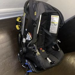 Doona Car Seat Stroller With Baby Insert And Base  Thumbnail