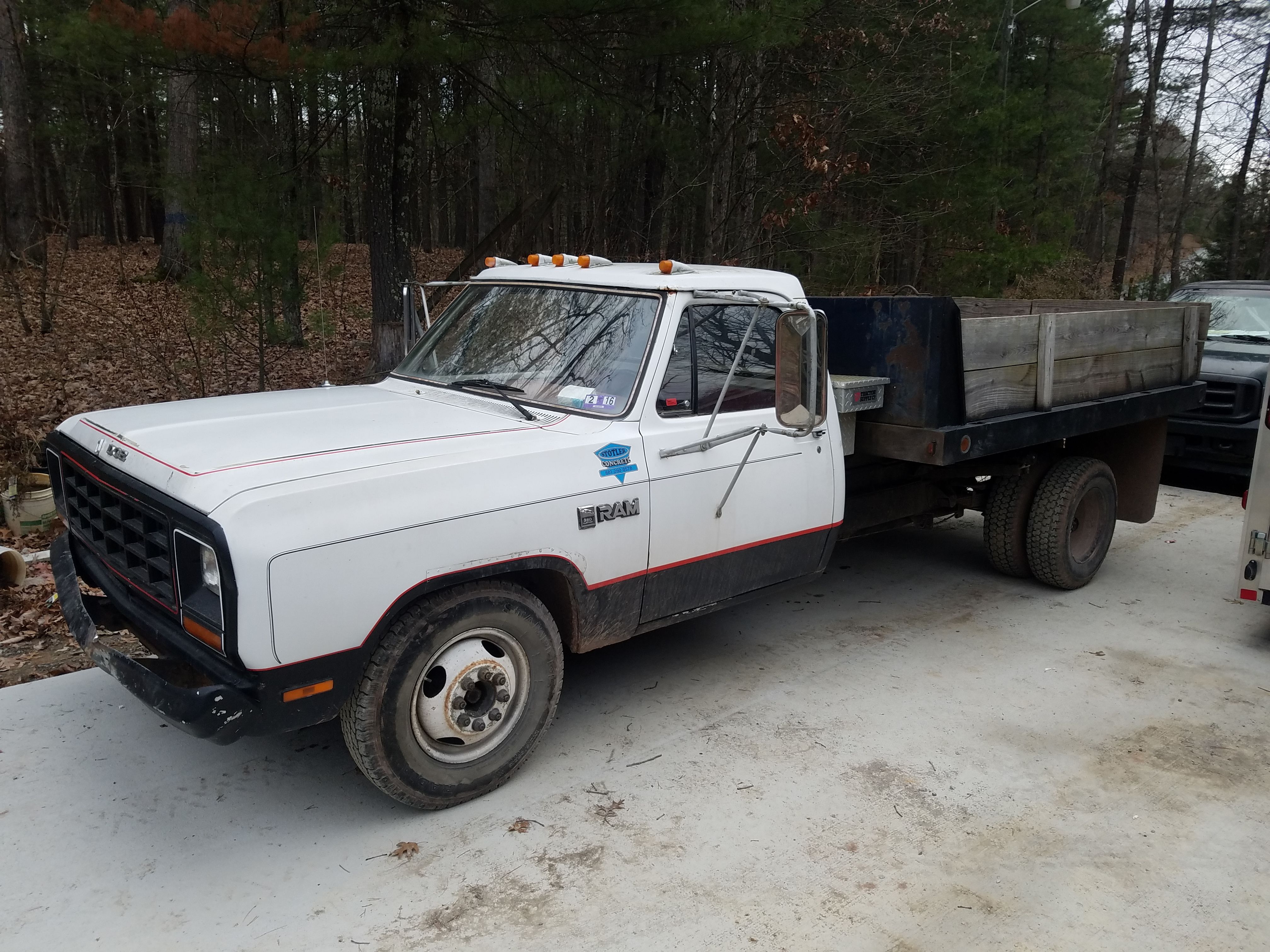 1984 dodge dump and 2012 trailer
