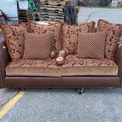 Brown Leather Couch Floral Designed Cushions and Pillows Thumbnail