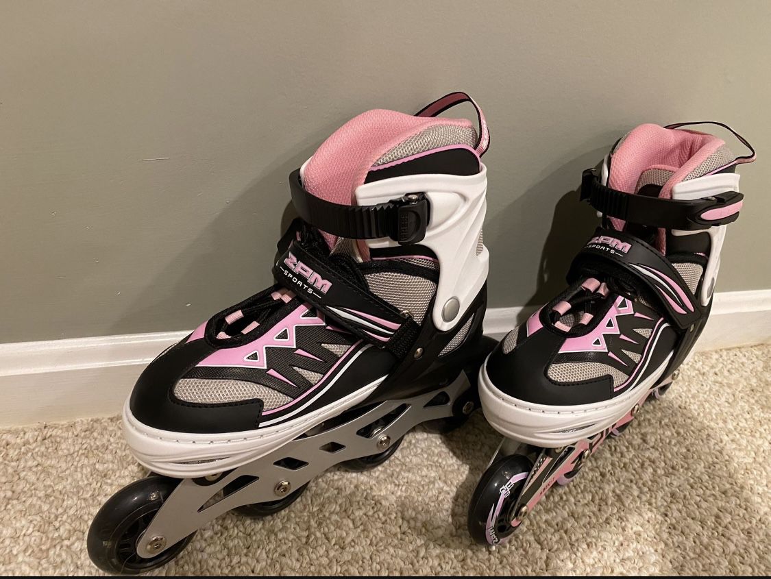 Inline Pink Skate and The Size Is adujstable! (never been used outside) 