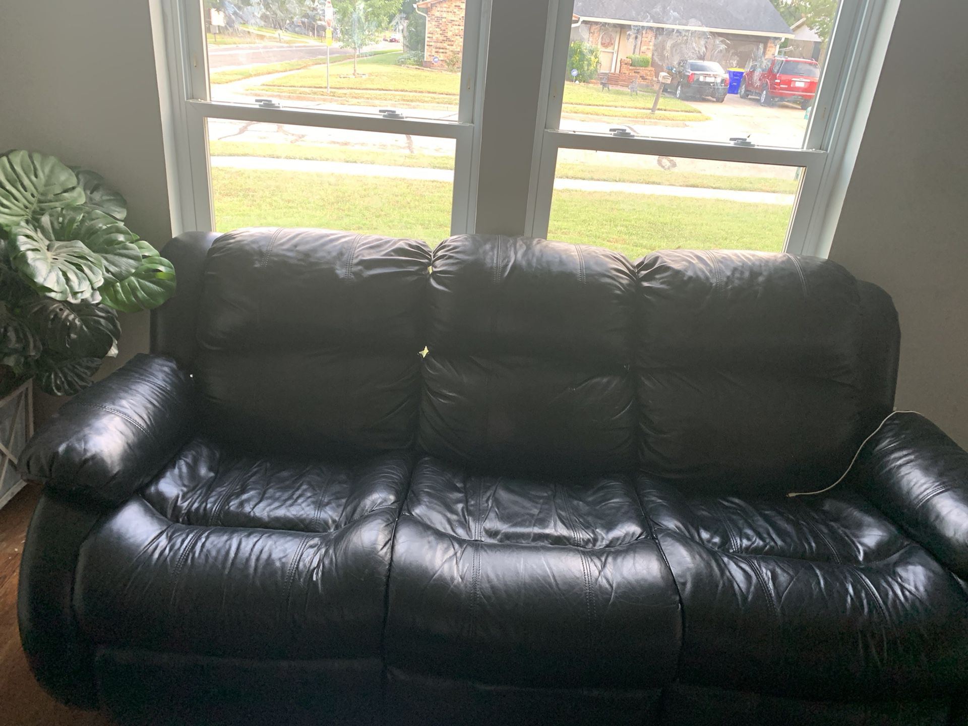  Black leather couch and loveseat 