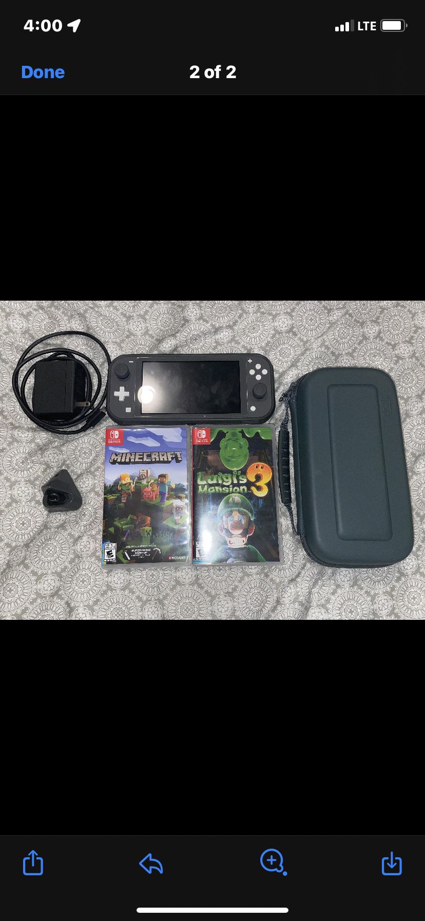 NITENDO SWITCH WITH CASE AND 2 GAMES