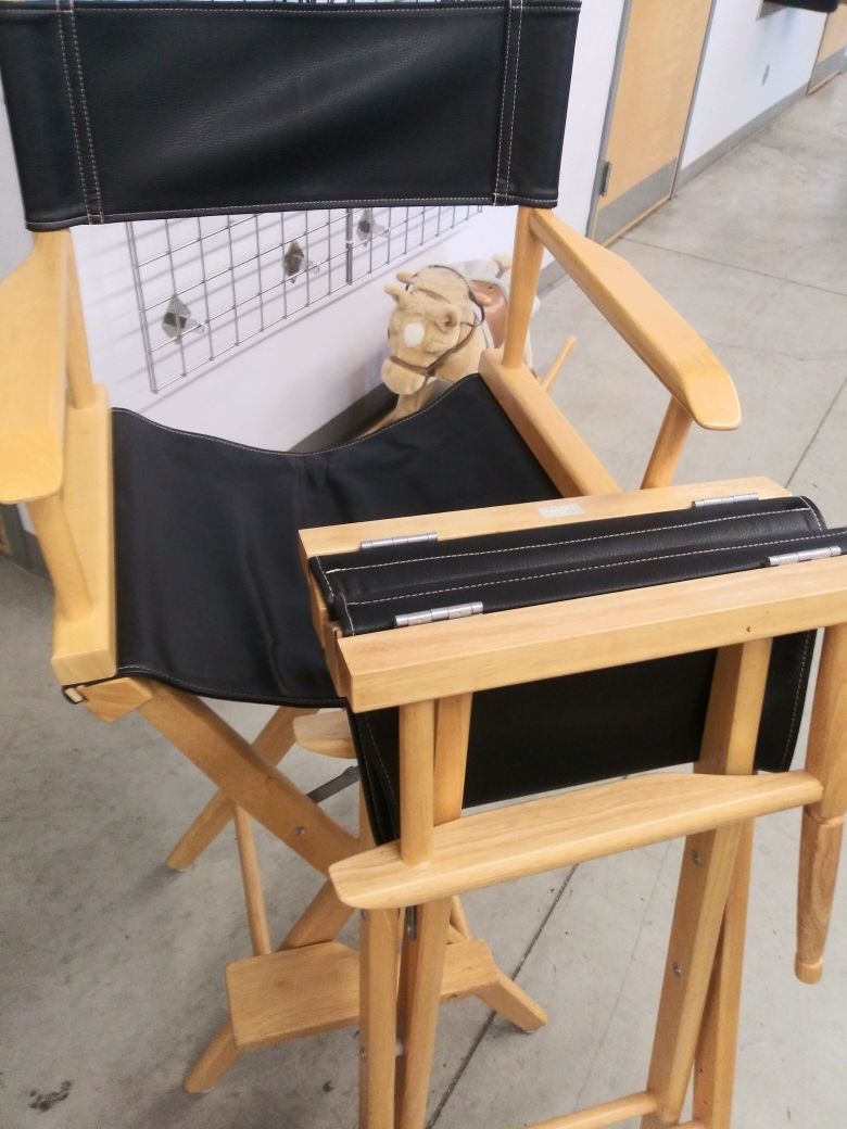 Very nice director chairs with extra brown interchangeable chair covers